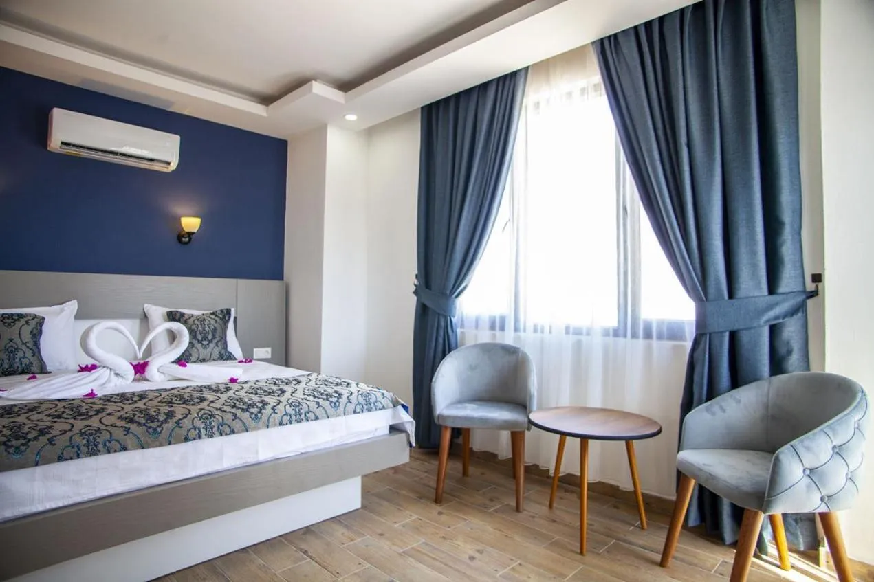 Bed in Demyra Boutique Hotel