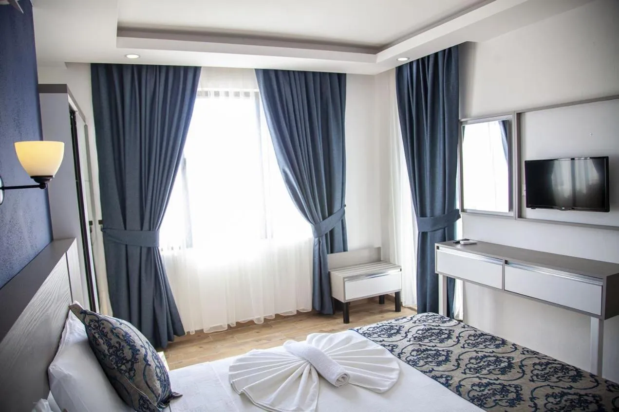 Bed in Demyra Boutique Hotel