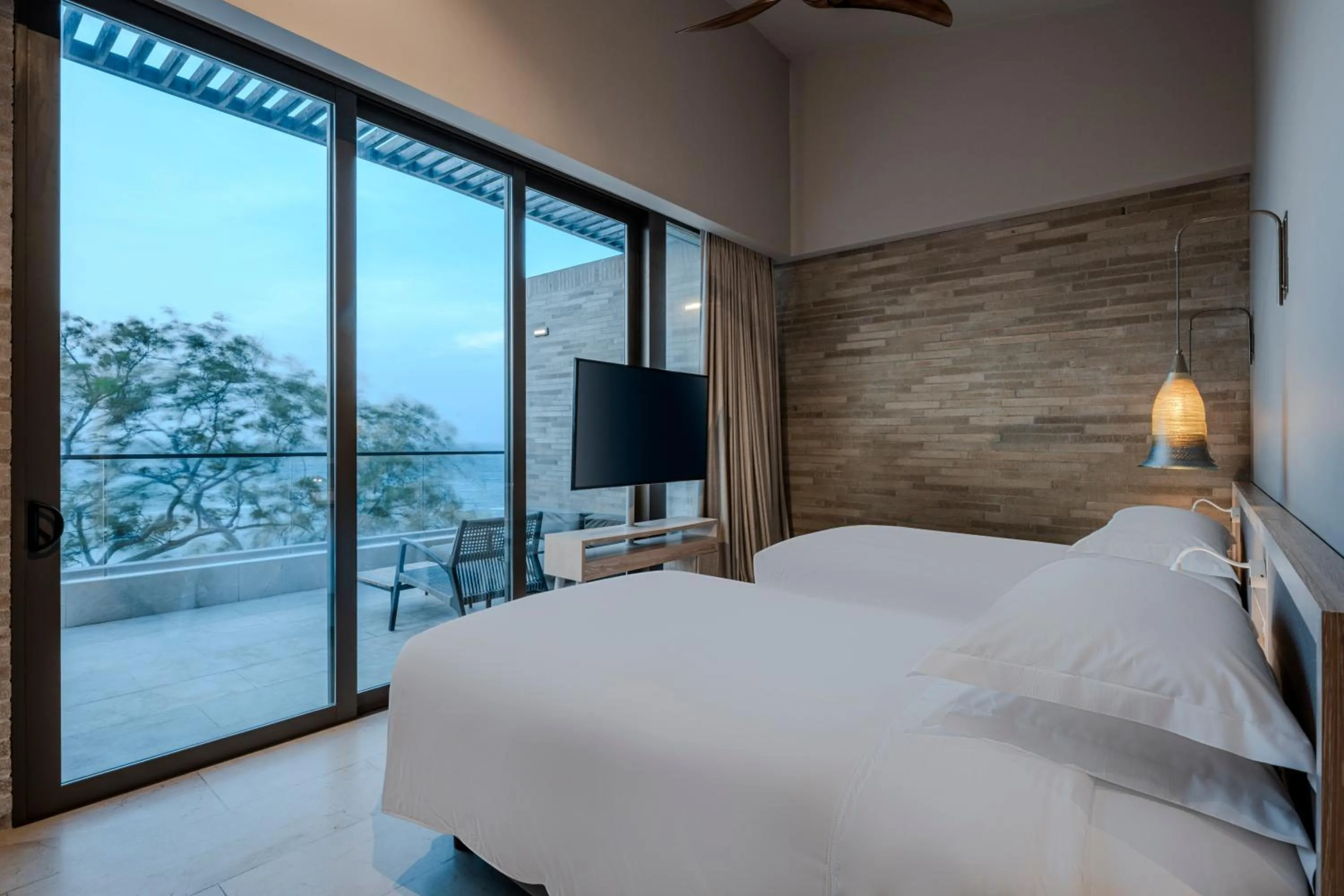 Bedroom, Bed in Sofitel Barú Cartagena