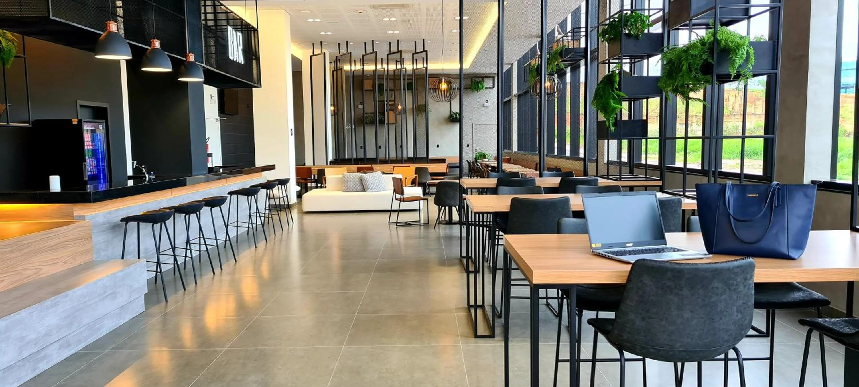 Lounge or bar in ibis Nova Serrana