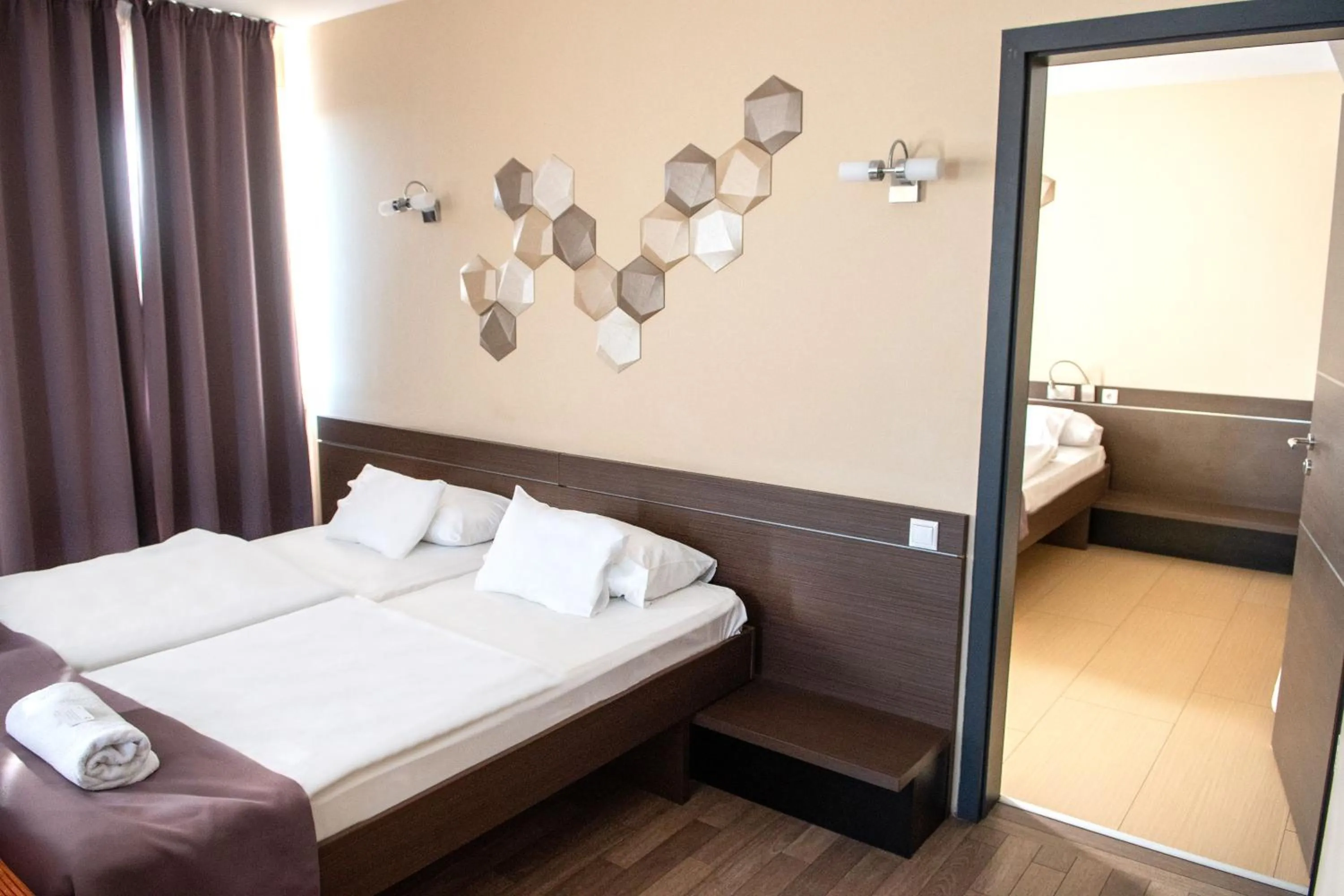 Bed in CE Plaza Hotel