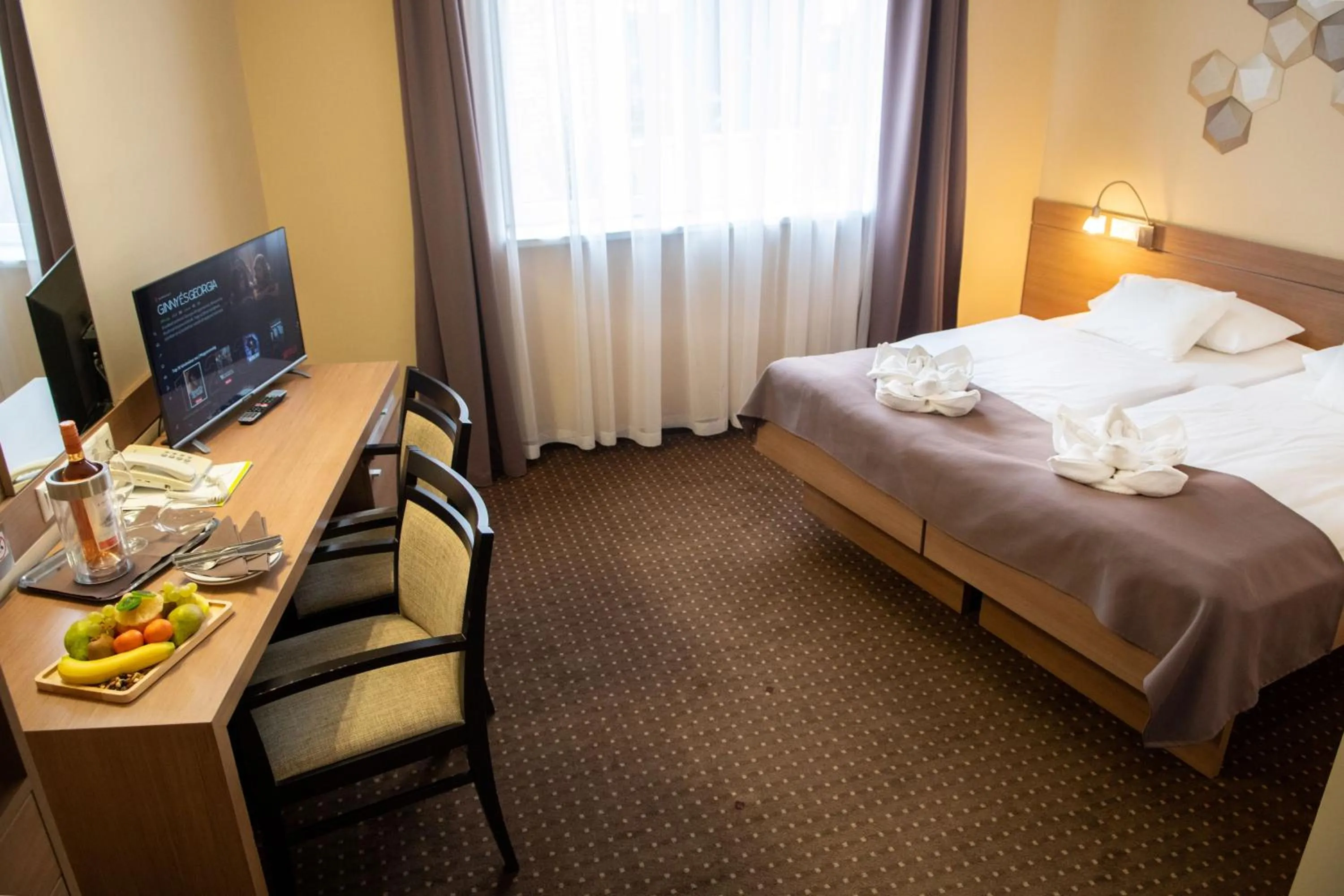 Bed in CE Plaza Hotel