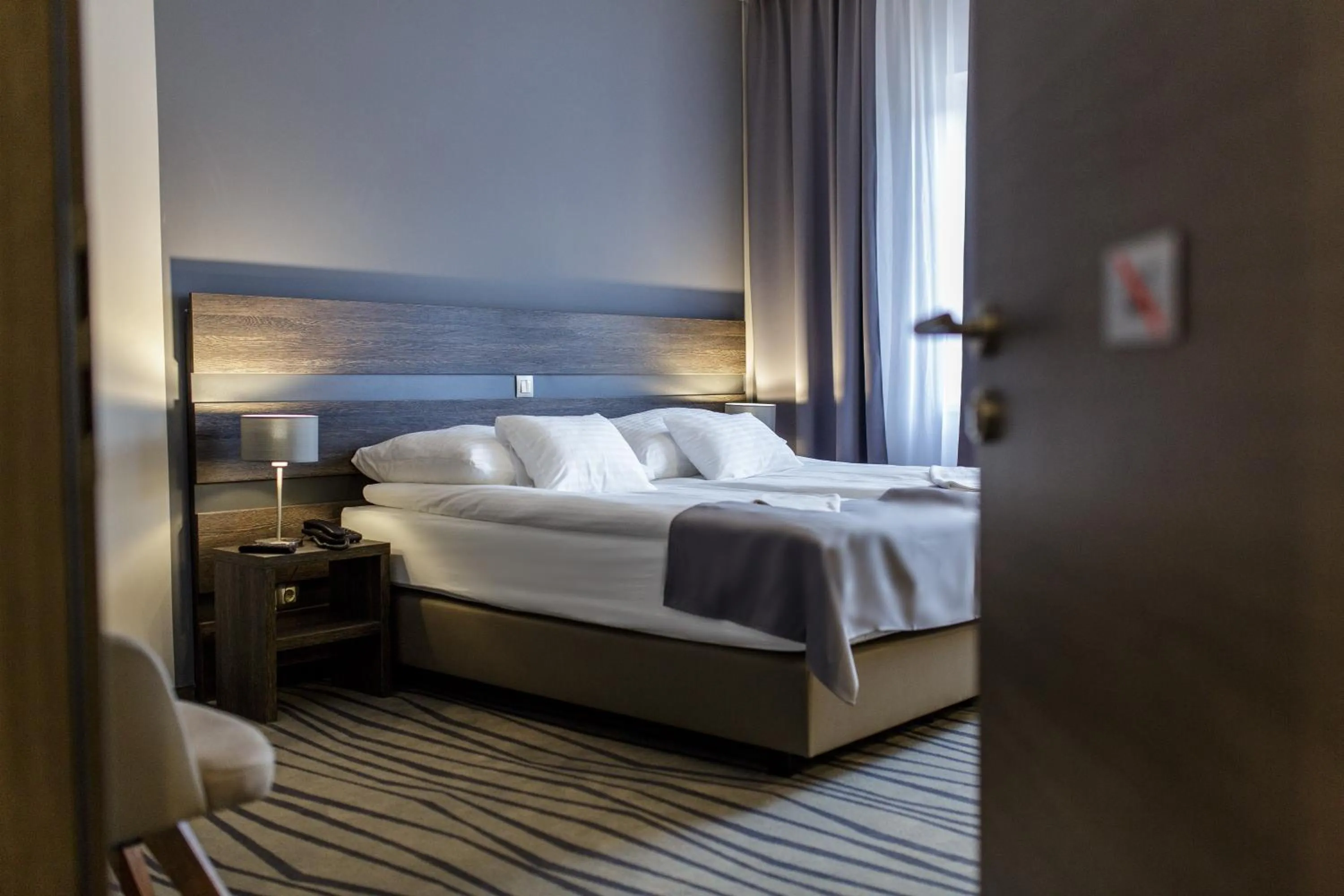 Bed in Öreg Miskolcz Hotel