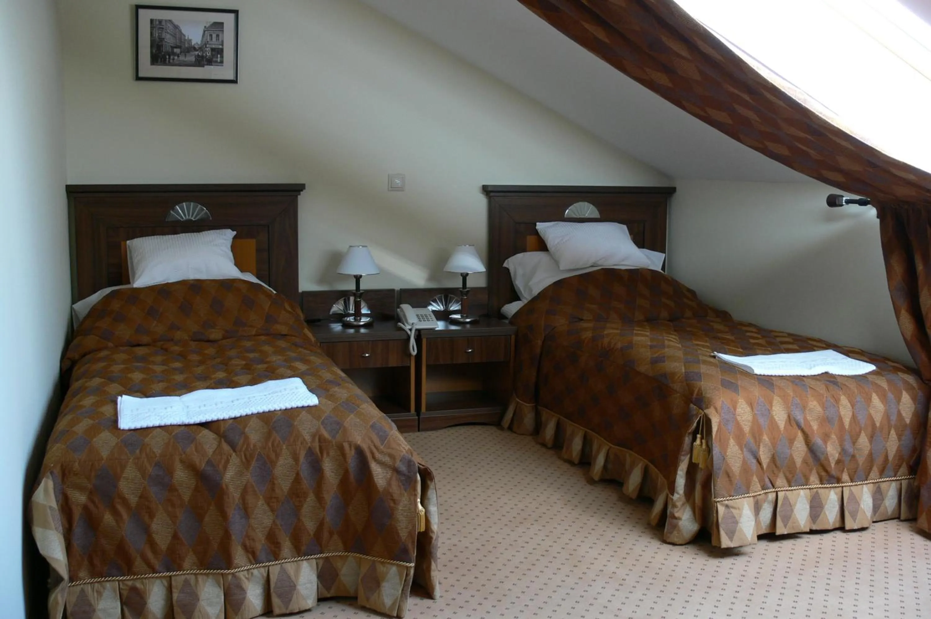 Bed in Öreg Miskolcz Hotel