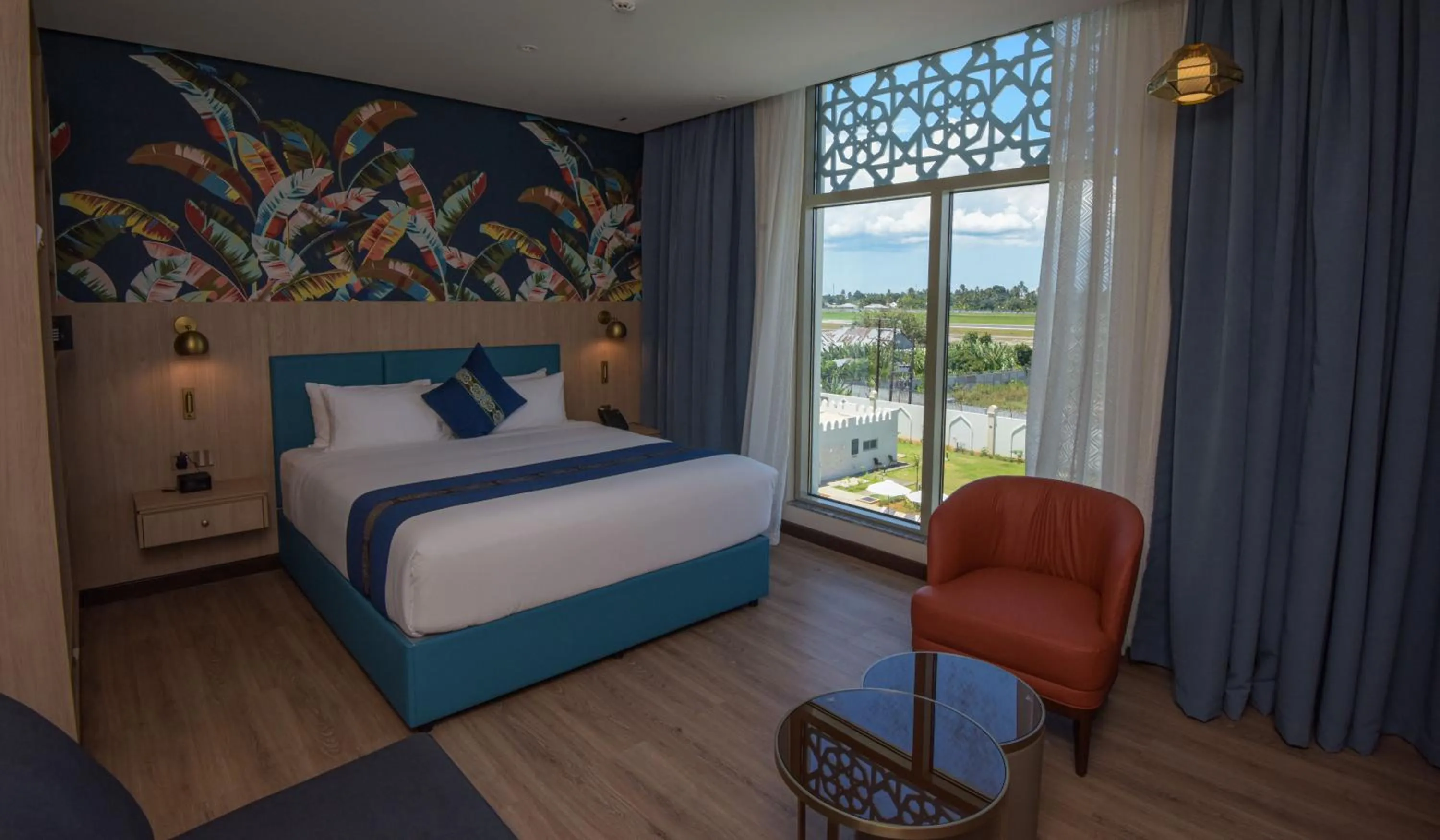 Bedroom, Bed in Golden Tulip Zanzibar Airport Hotel & Spa