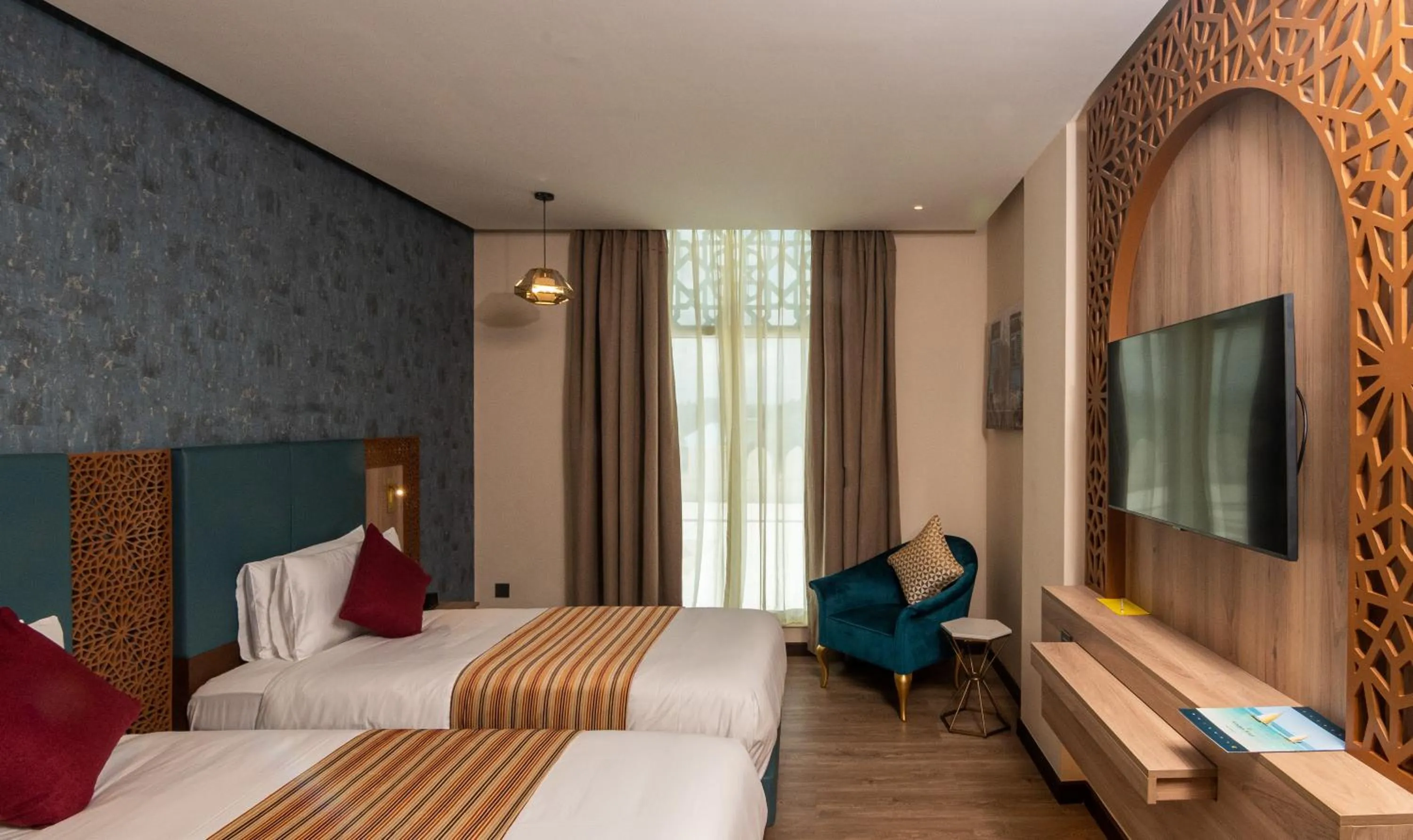 Photo of the whole room, Bed in Golden Tulip Zanzibar Airport Hotel & Spa