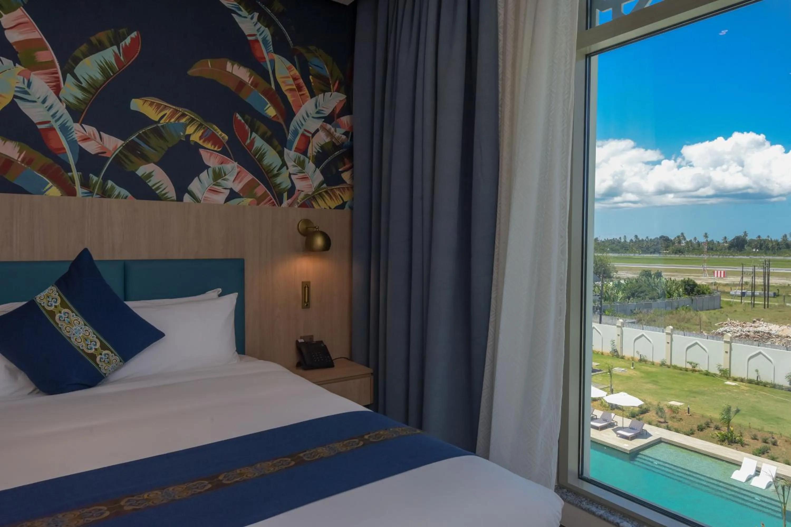 Bed in Golden Tulip Zanzibar Airport Hotel & Spa