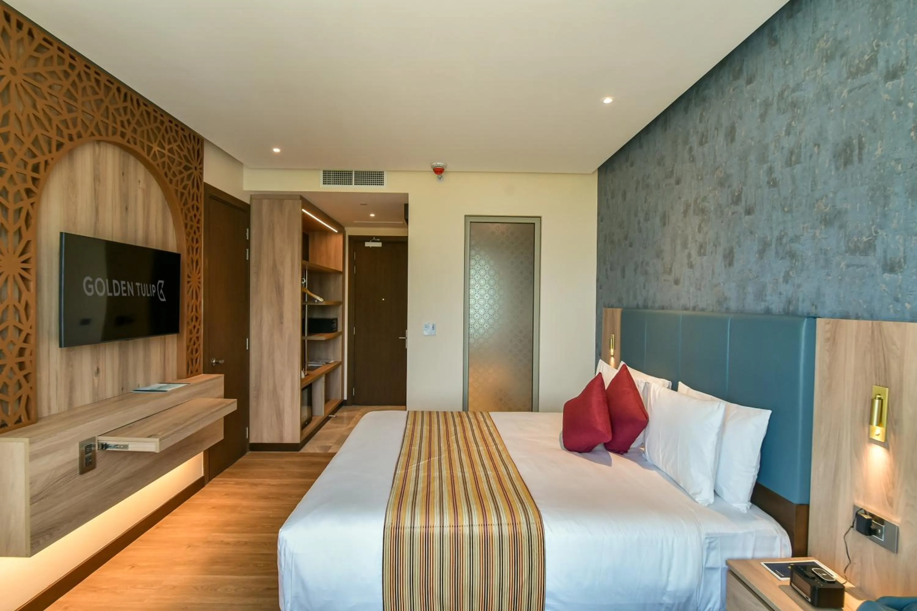 Bed in Golden Tulip Zanzibar Airport Hotel & Spa