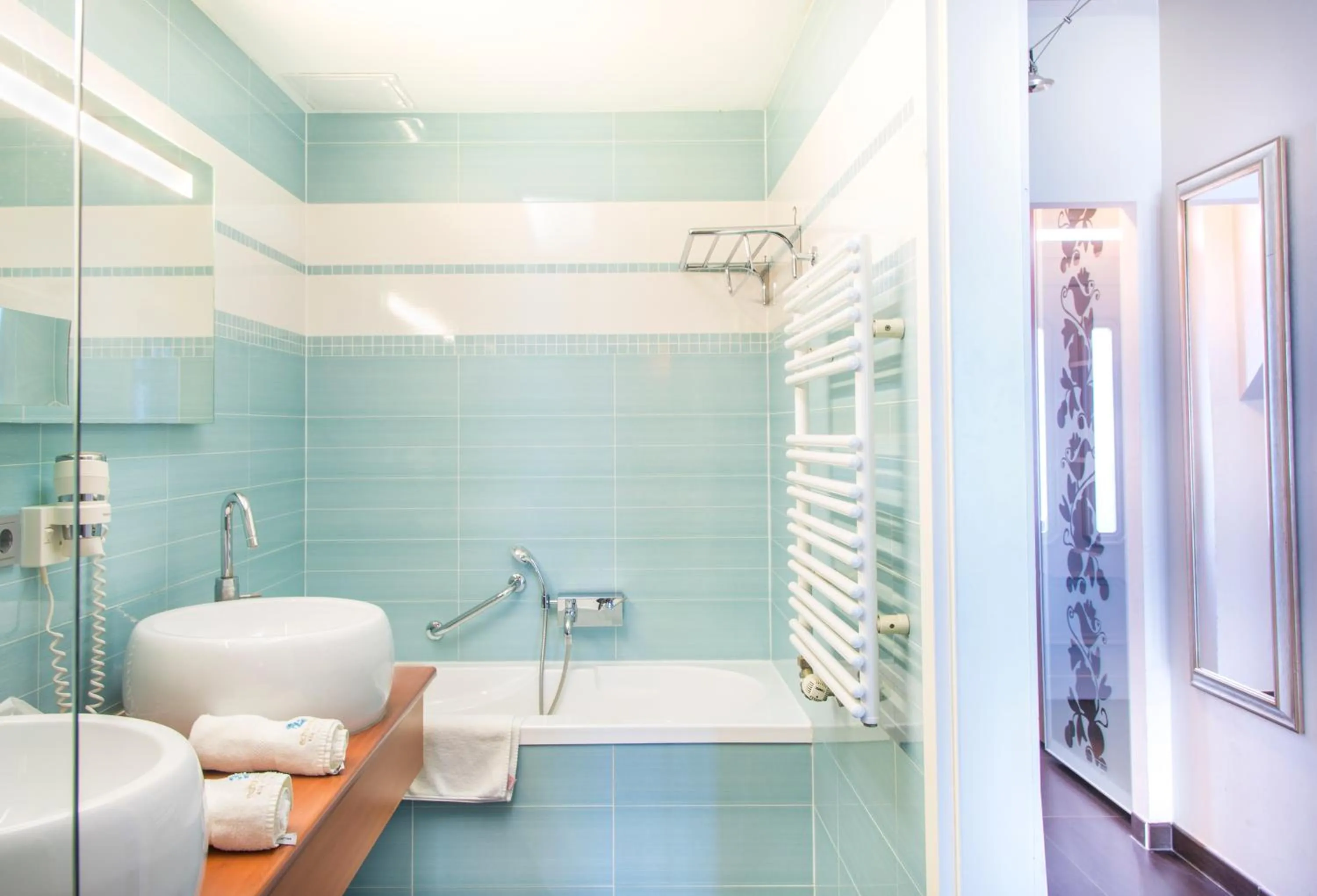 Bathroom in Echo Residence All Suite Hotel
