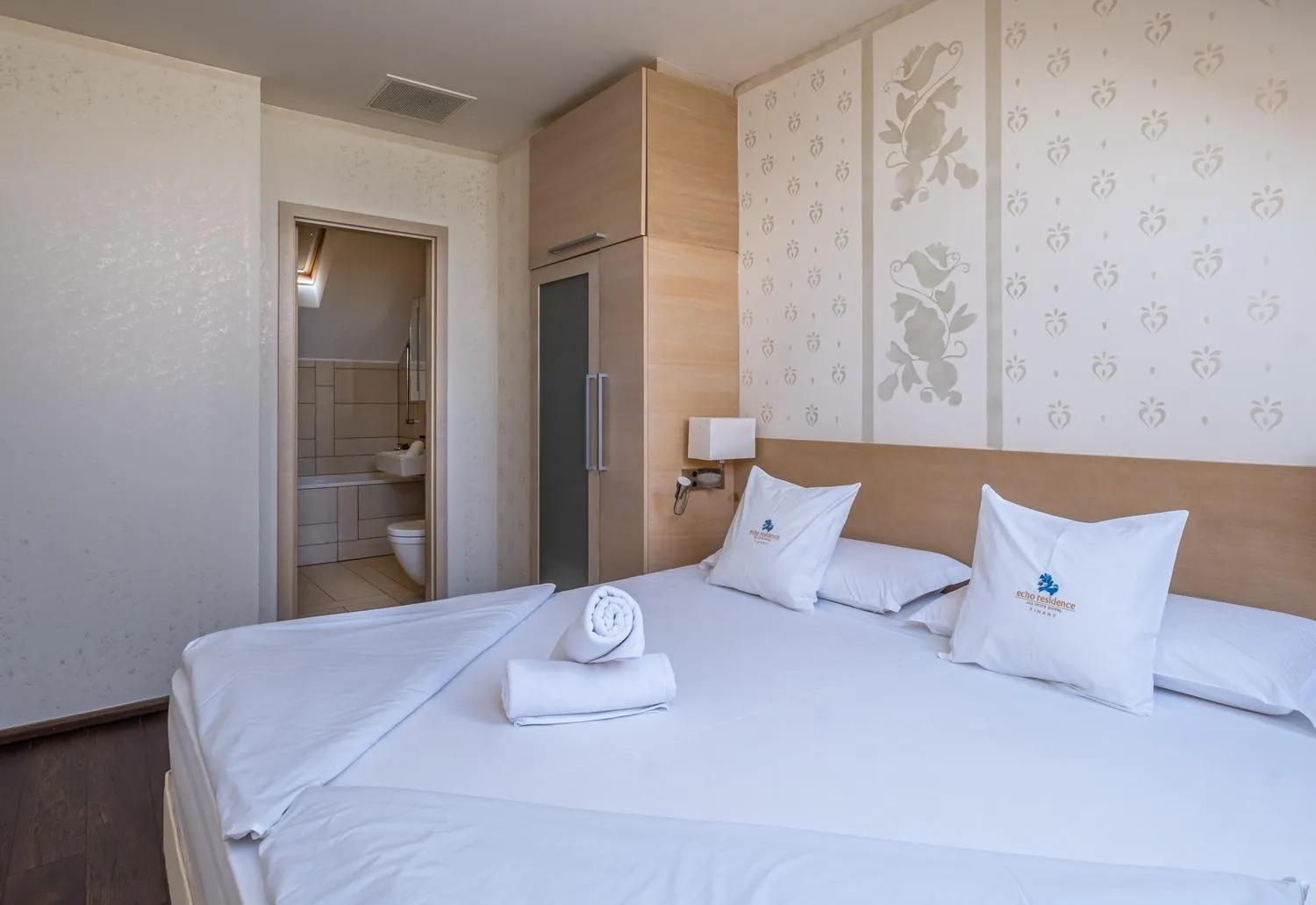 Bedroom in Echo Residence All Suite Hotel