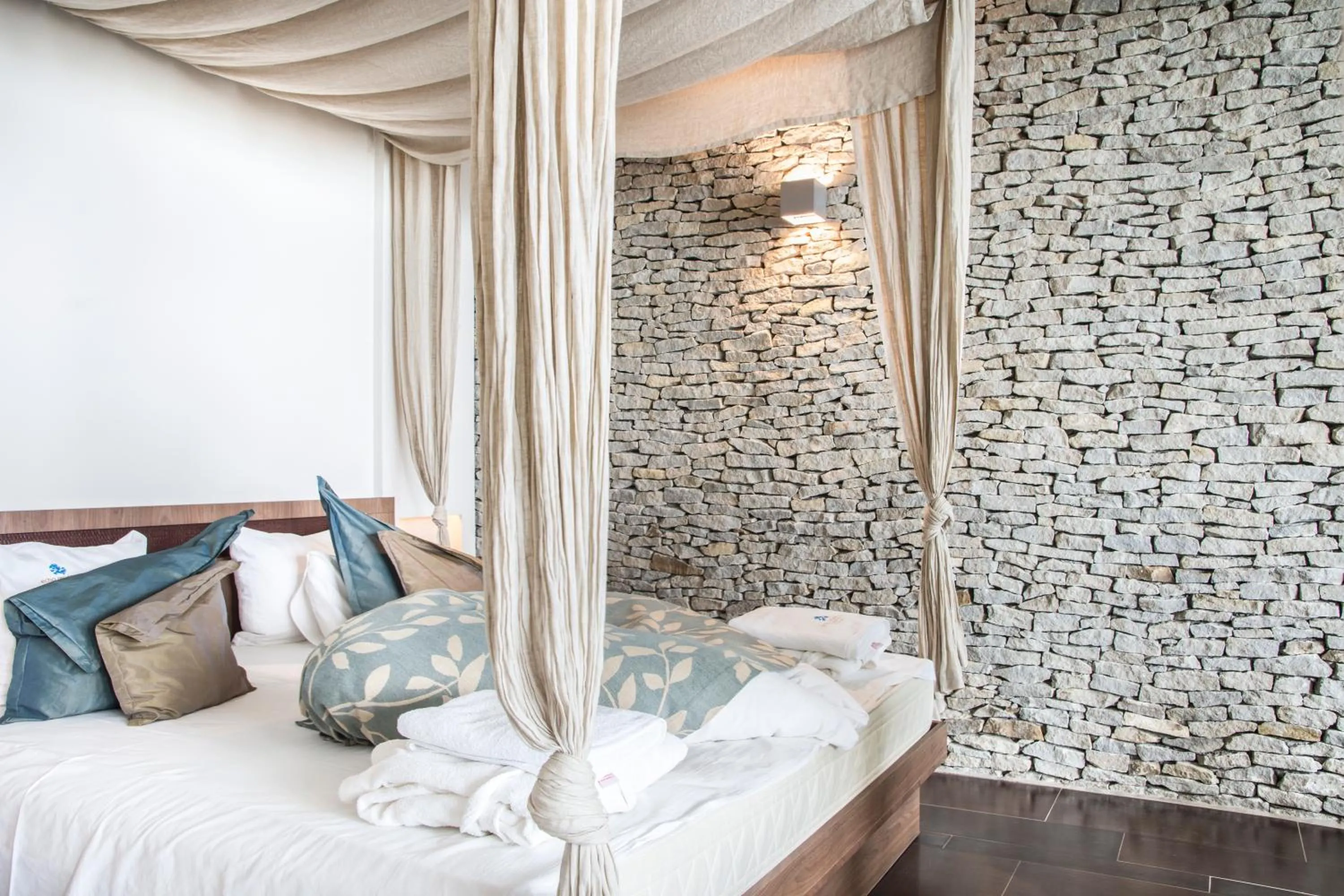 Bedroom in Echo Residence All Suite Hotel