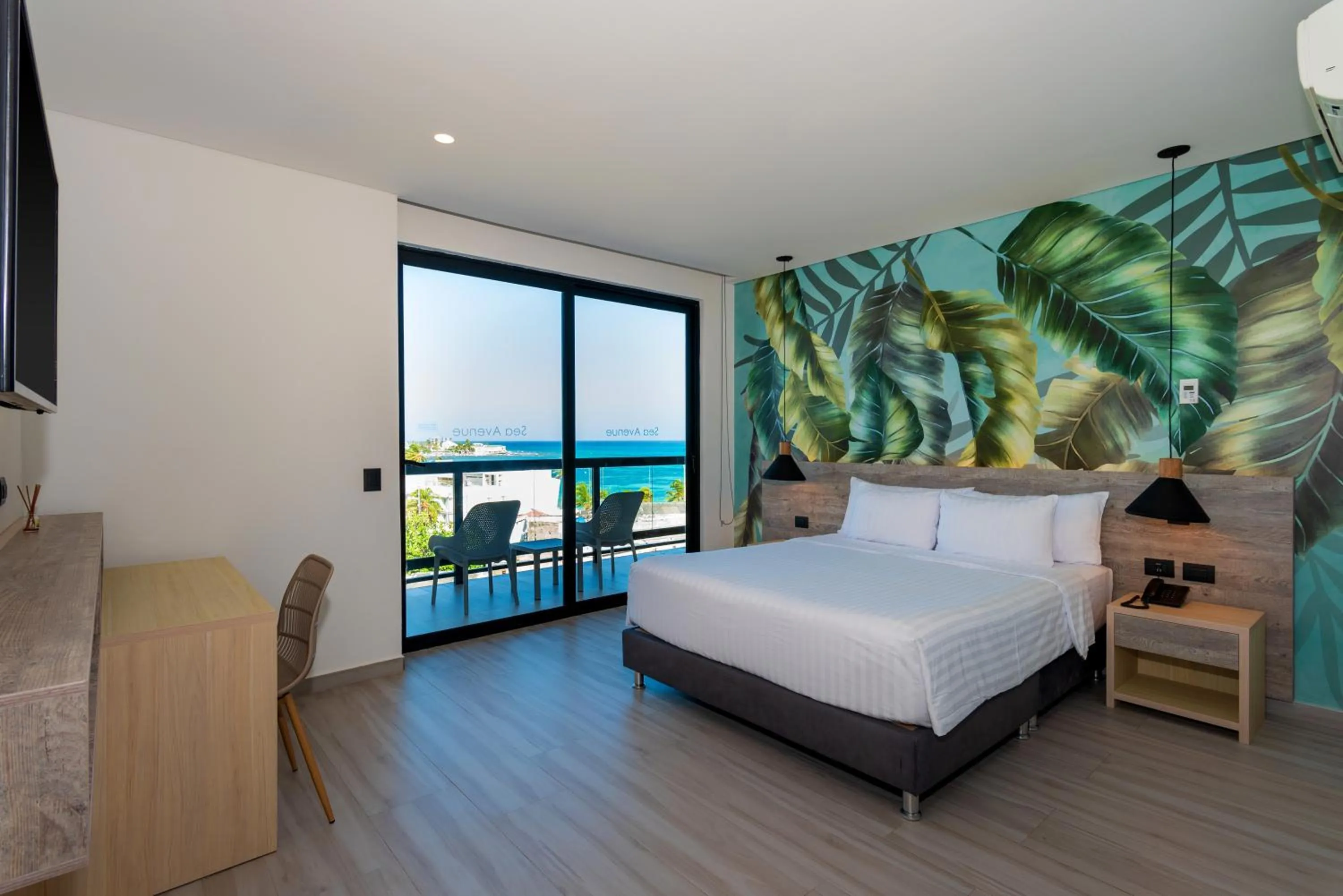 Photo of the whole room, Bed in Sea Avenue Hotel