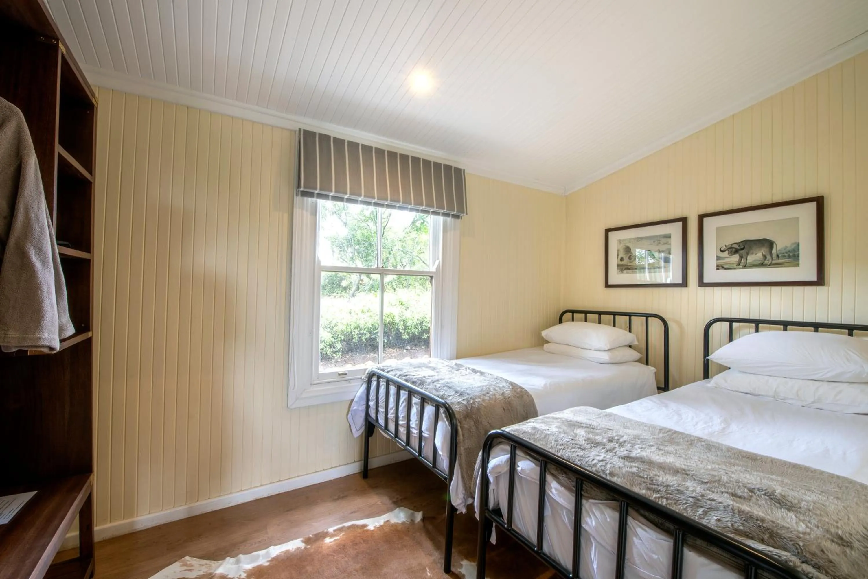 Bed in Camp Figtree by The Oyster Collection