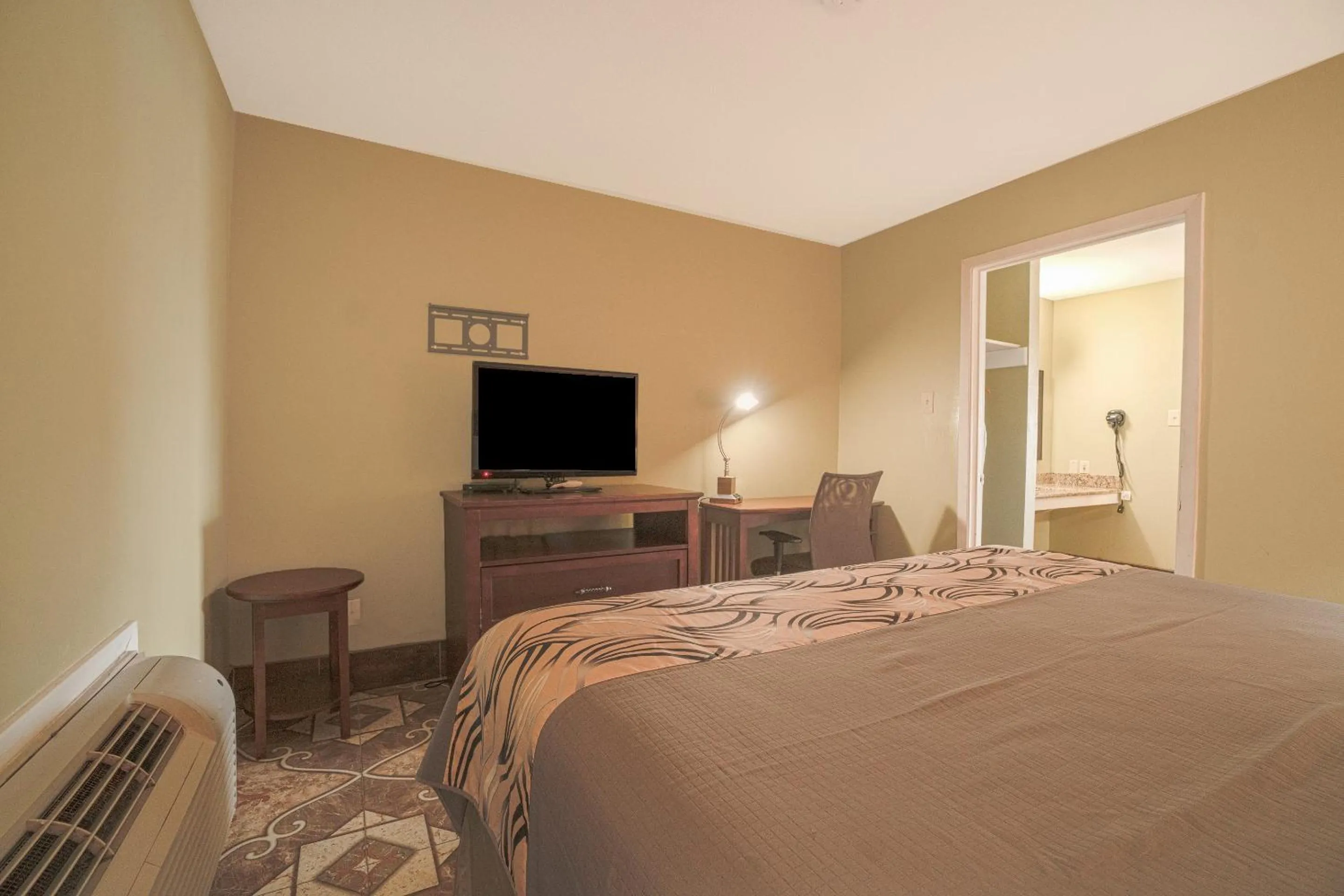 Bedroom, Bed in Aransas Bay Inn & Suites Corpus Christi by OYO