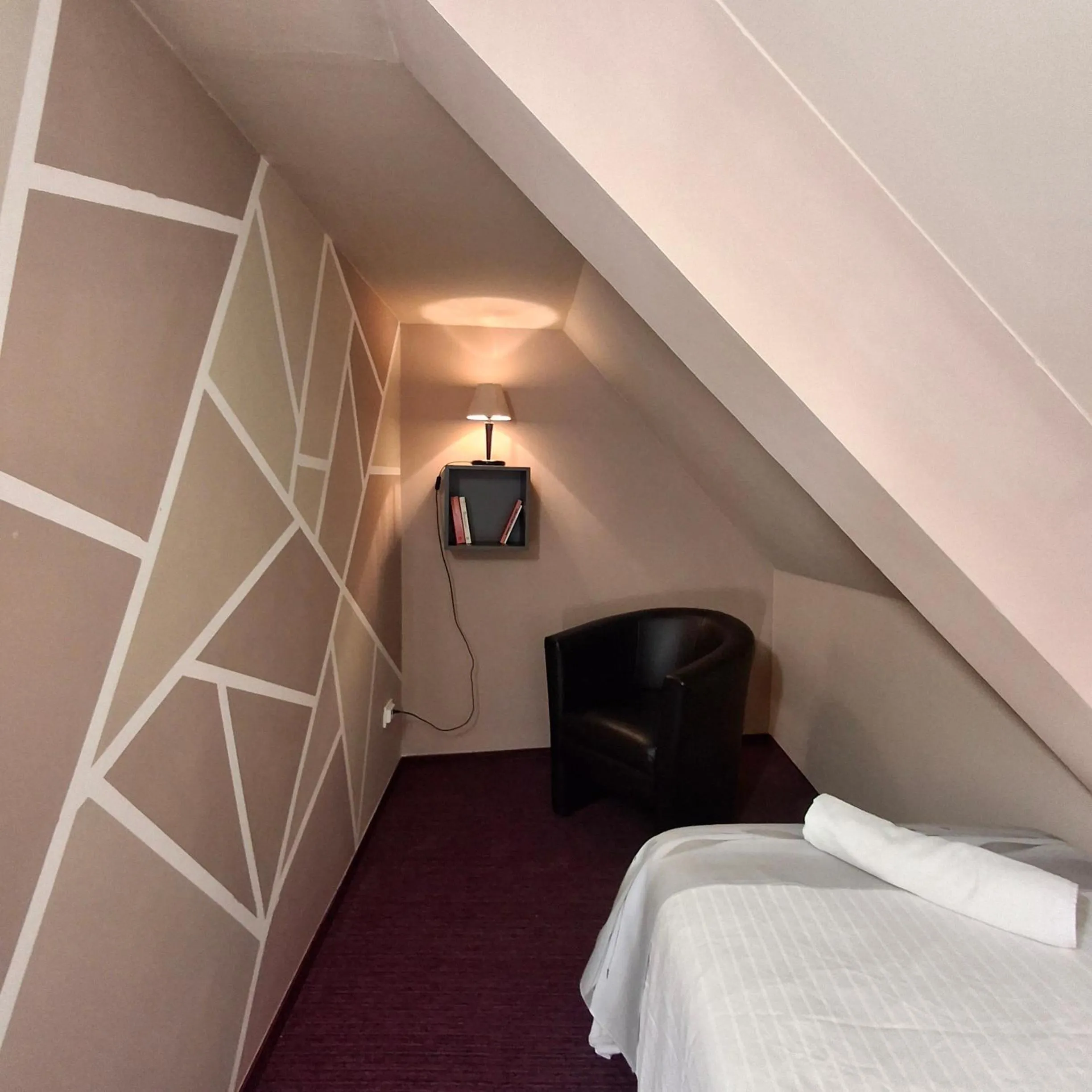 Bed in Hotel Unicornis