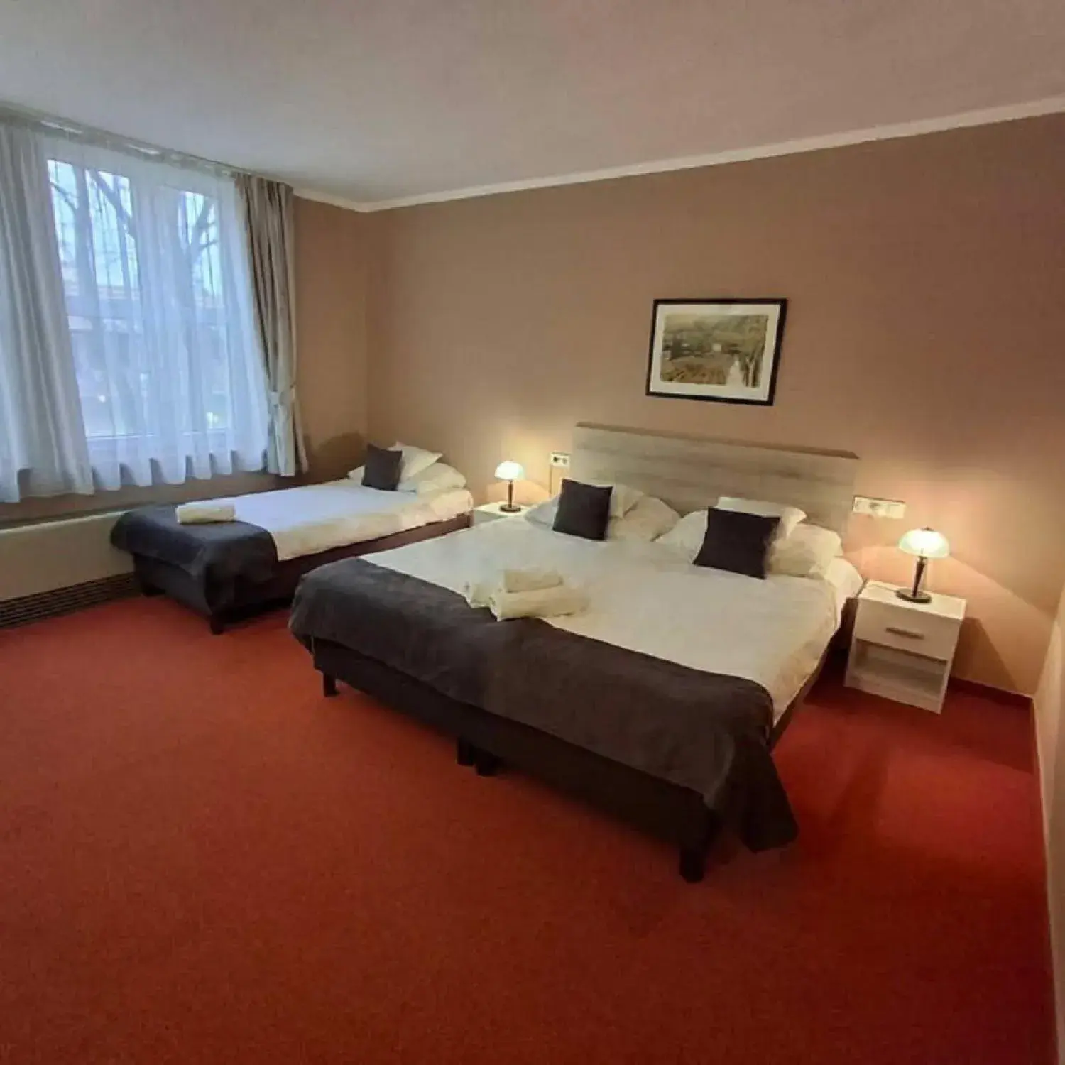 Triple Room in Hotel Unicornis Triple Room in Hotel Unicornis