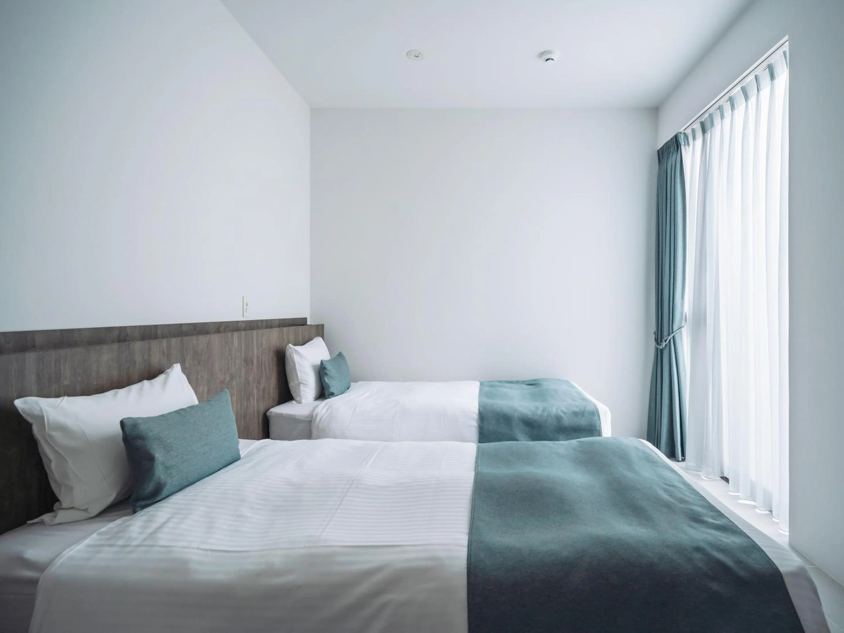 Photo of the whole room, Bed in Blue Rela Luxe Resort Okinawa