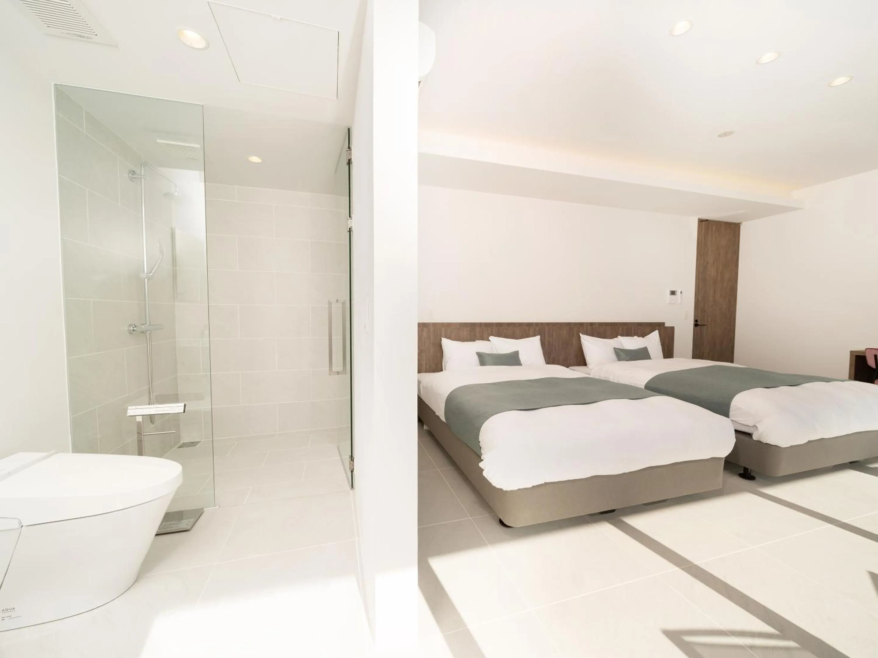 Bathroom, Bed in Blue Rela Luxe Resort Okinawa