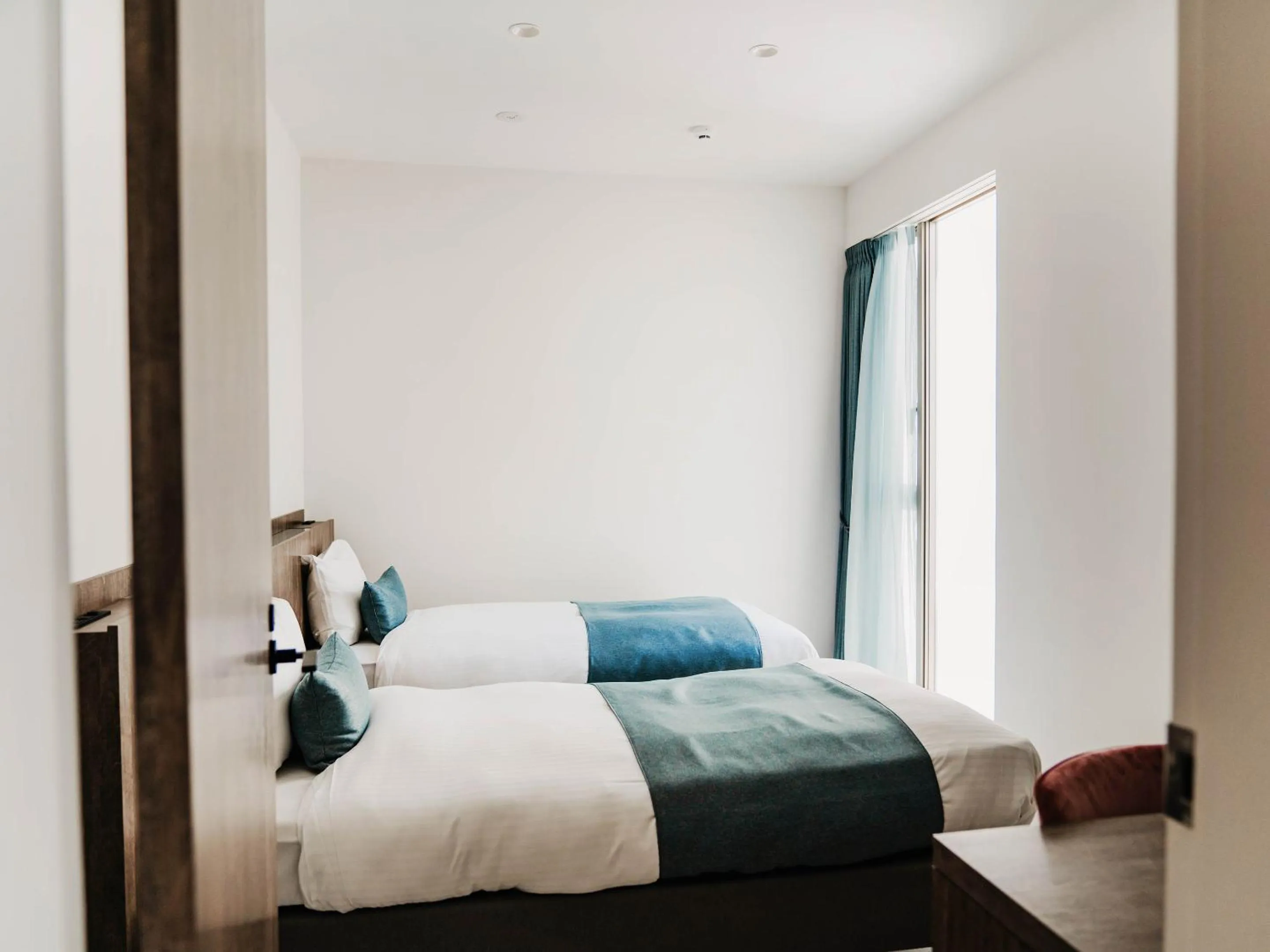 Photo of the whole room, Bed in Blue Rela Luxe Resort Okinawa