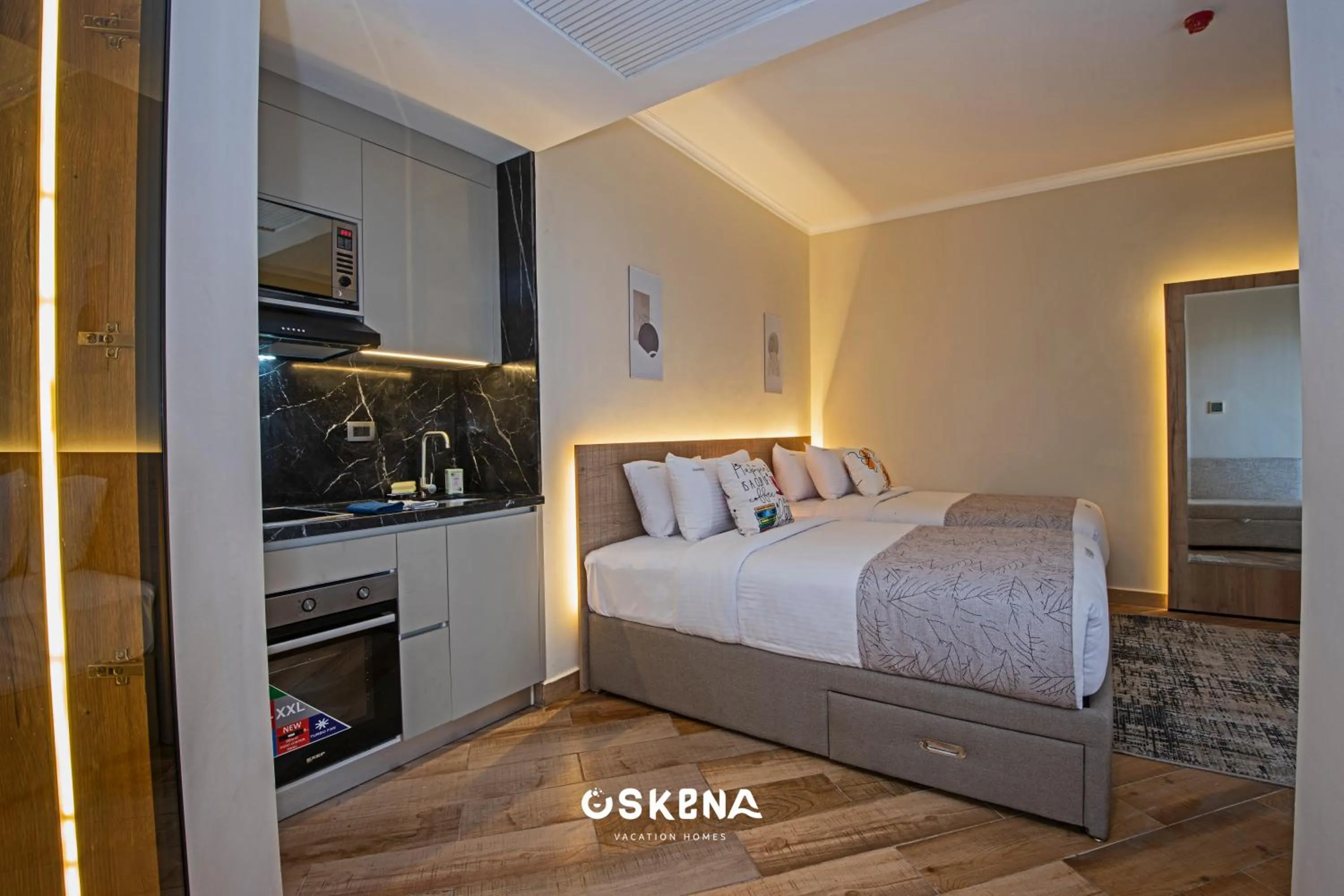 Kitchen or kitchenette, Bed in OSKENA Azzurra Sahl Hasheesh Hurghada