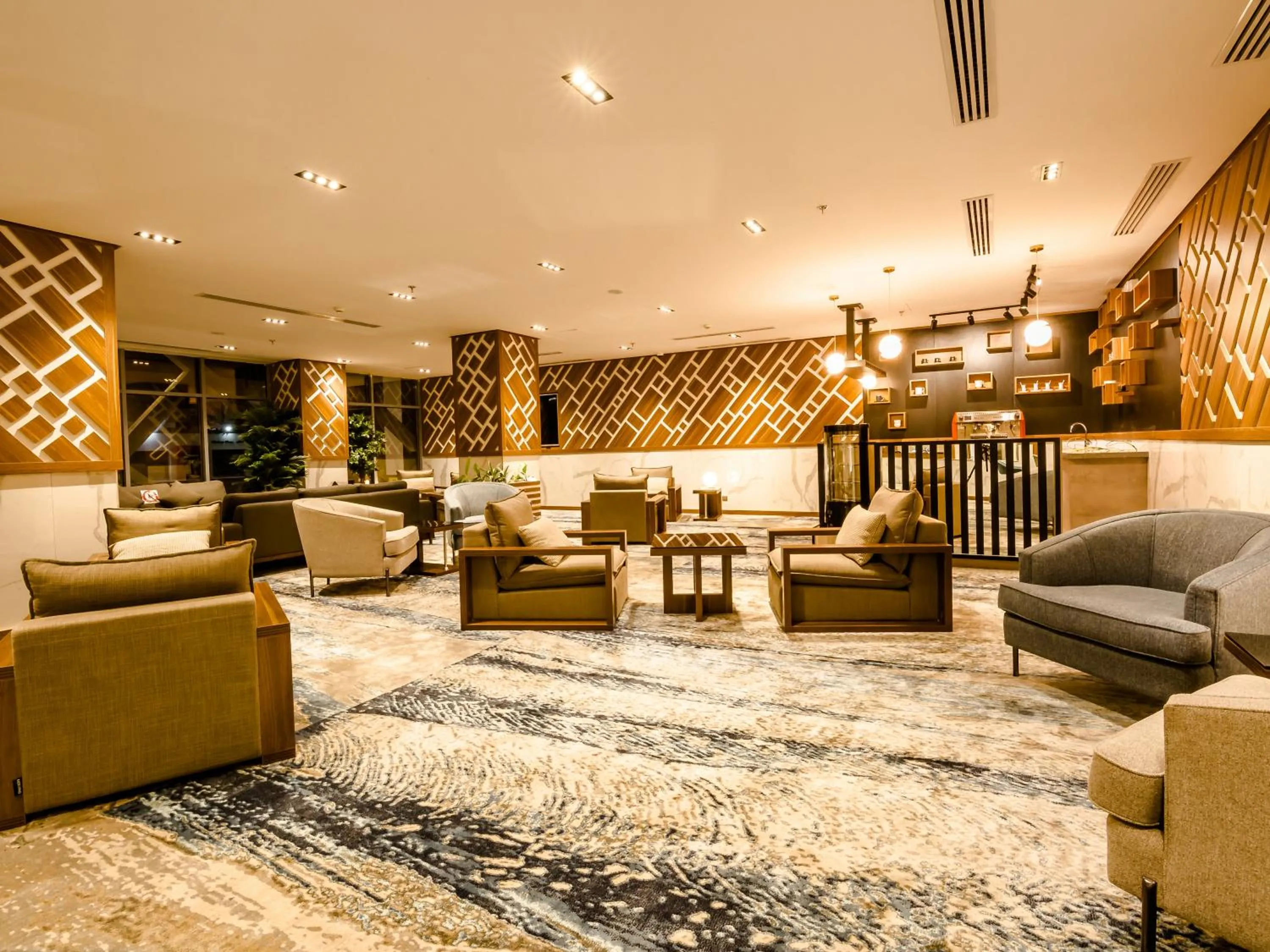 Seating area in White Diamond Hotel Sari