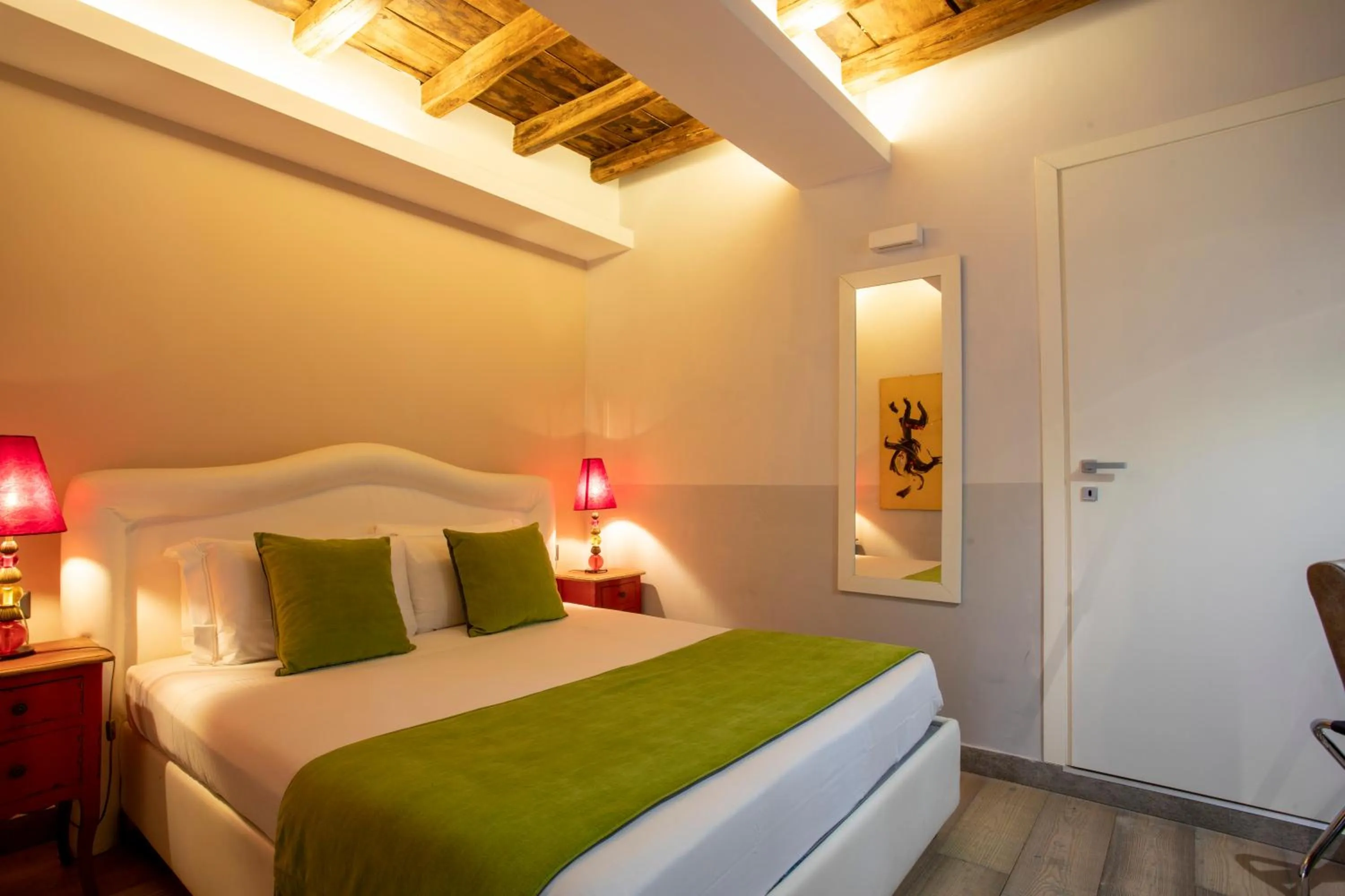 Bed in Corso Suite 107 Rooms Wellness & Spa