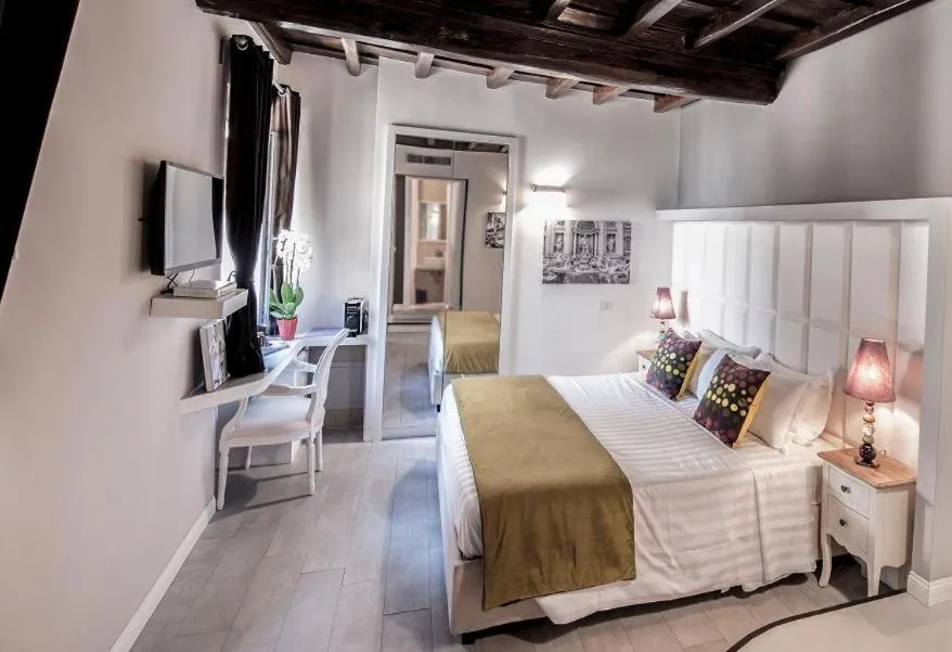 Photo of the whole room, Bed in Corso Suite 107 Rooms Wellness & Spa