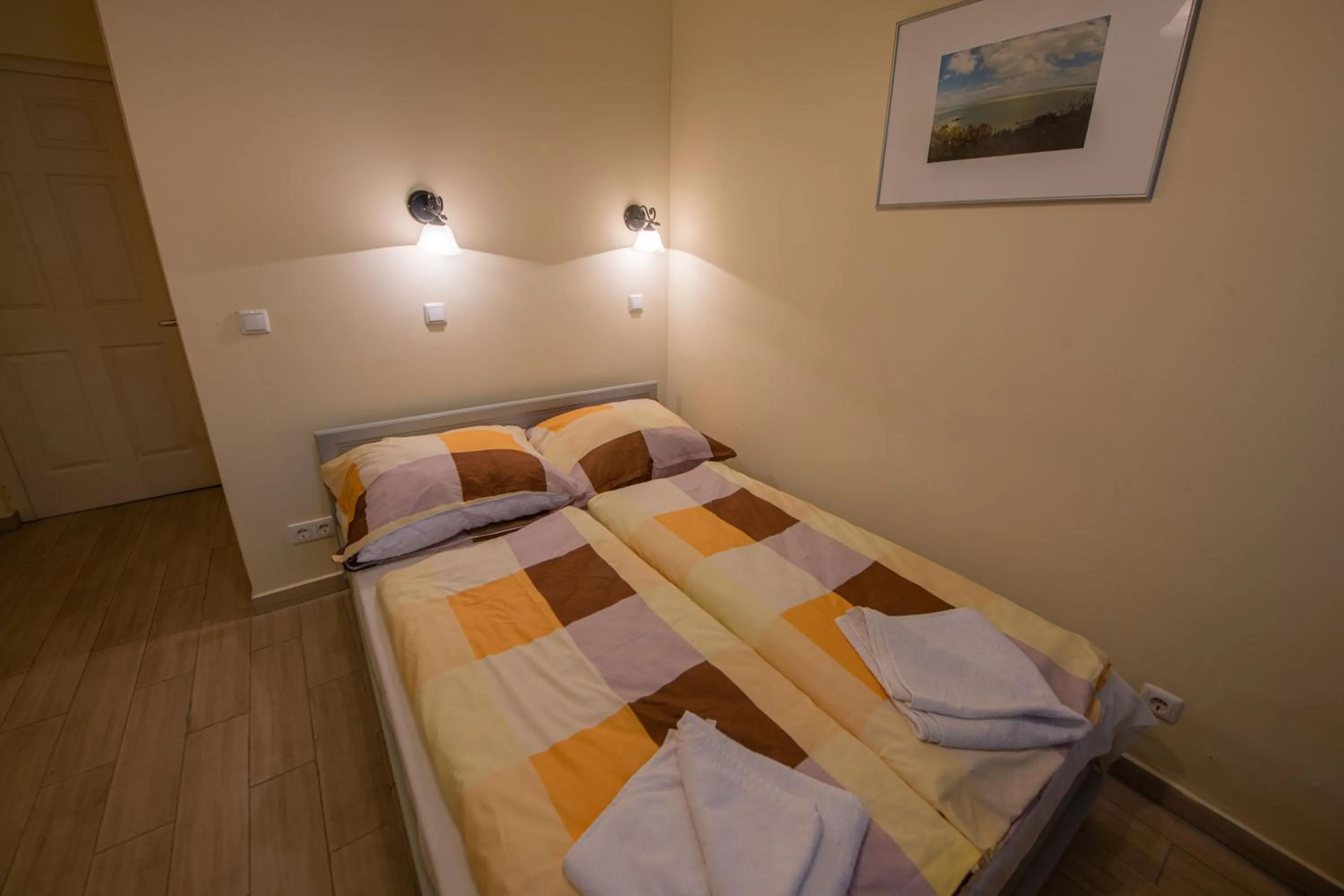 Bed in Pater Apartments and Rooms
