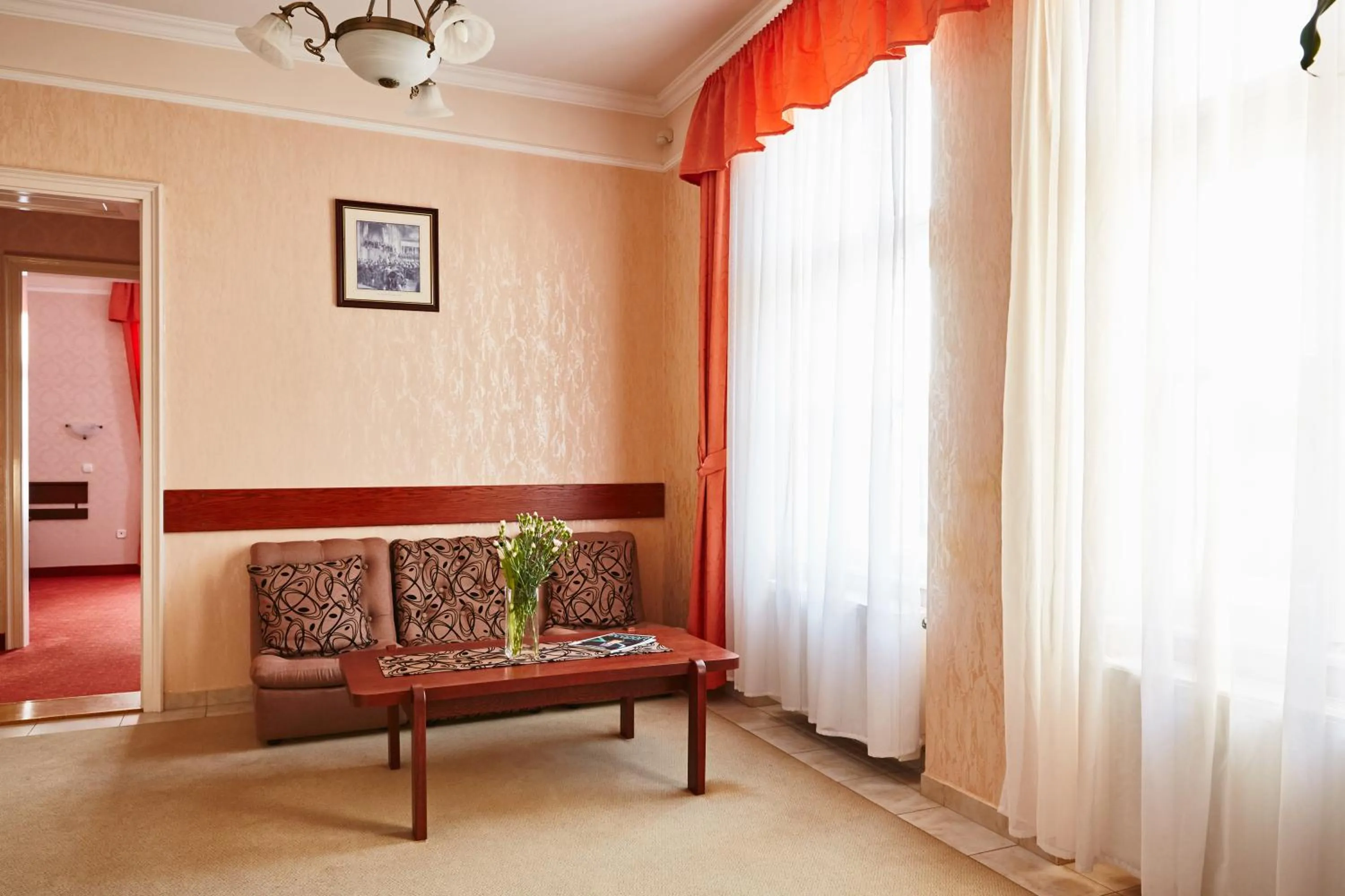 Communal lounge/ TV room in Hotel Astoria