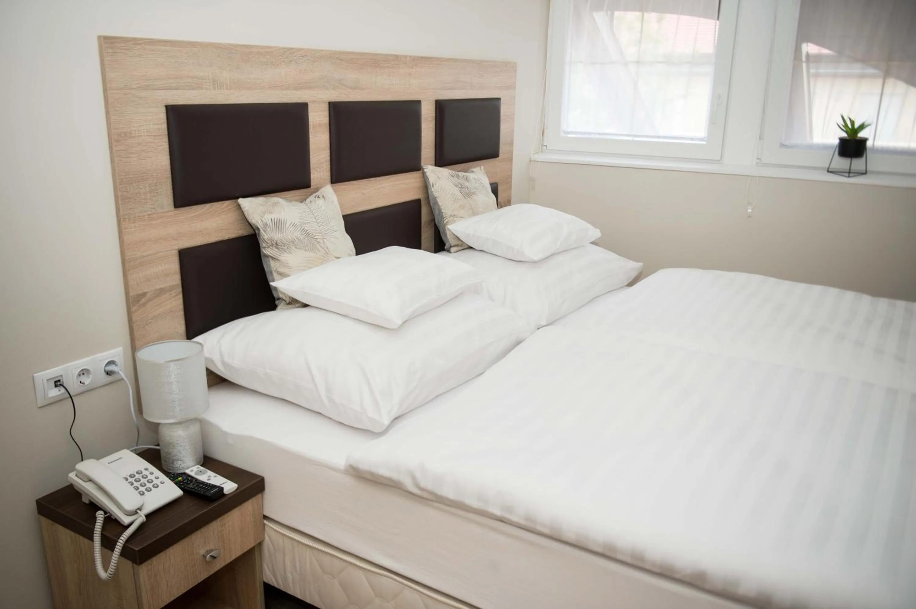 Bed in Hozam Wellness és Apartman