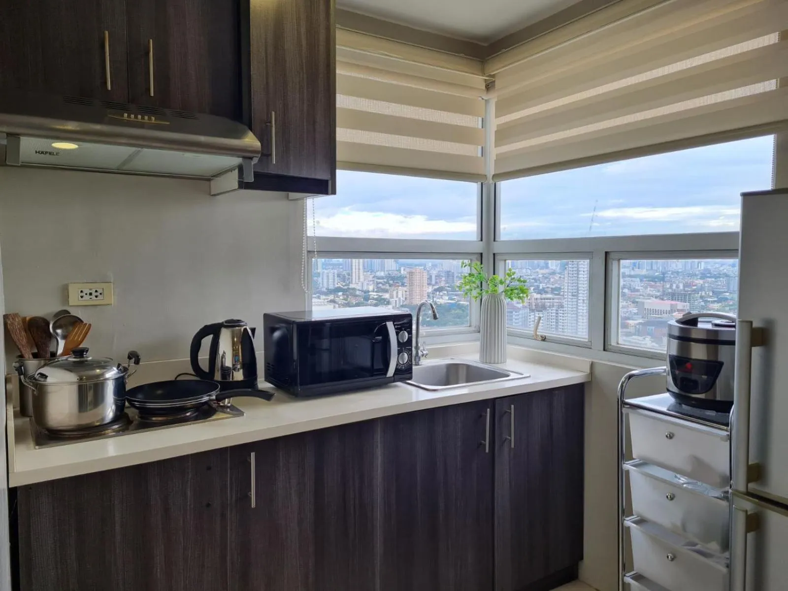Kitchen or kitchenette in Gilmore Tower Suites By SMS Hospitality