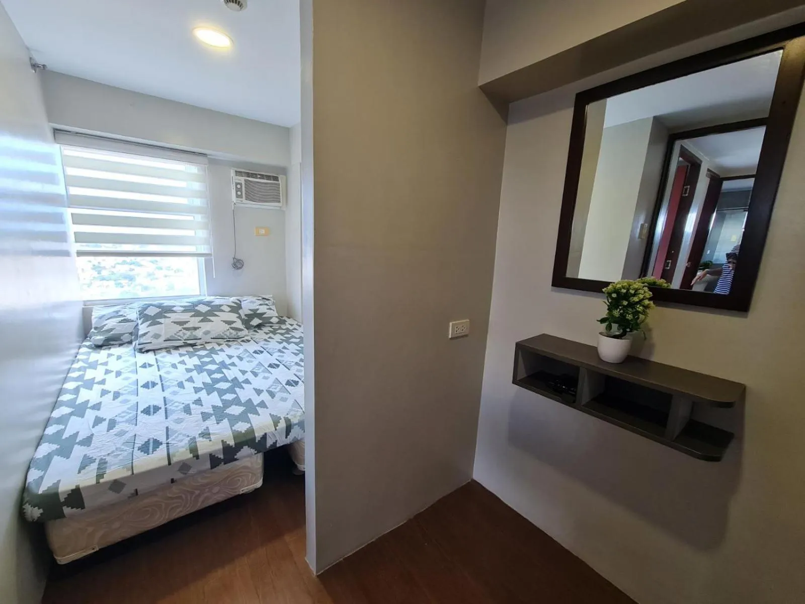 Bed in Gilmore Tower Suites By SMS Hospitality