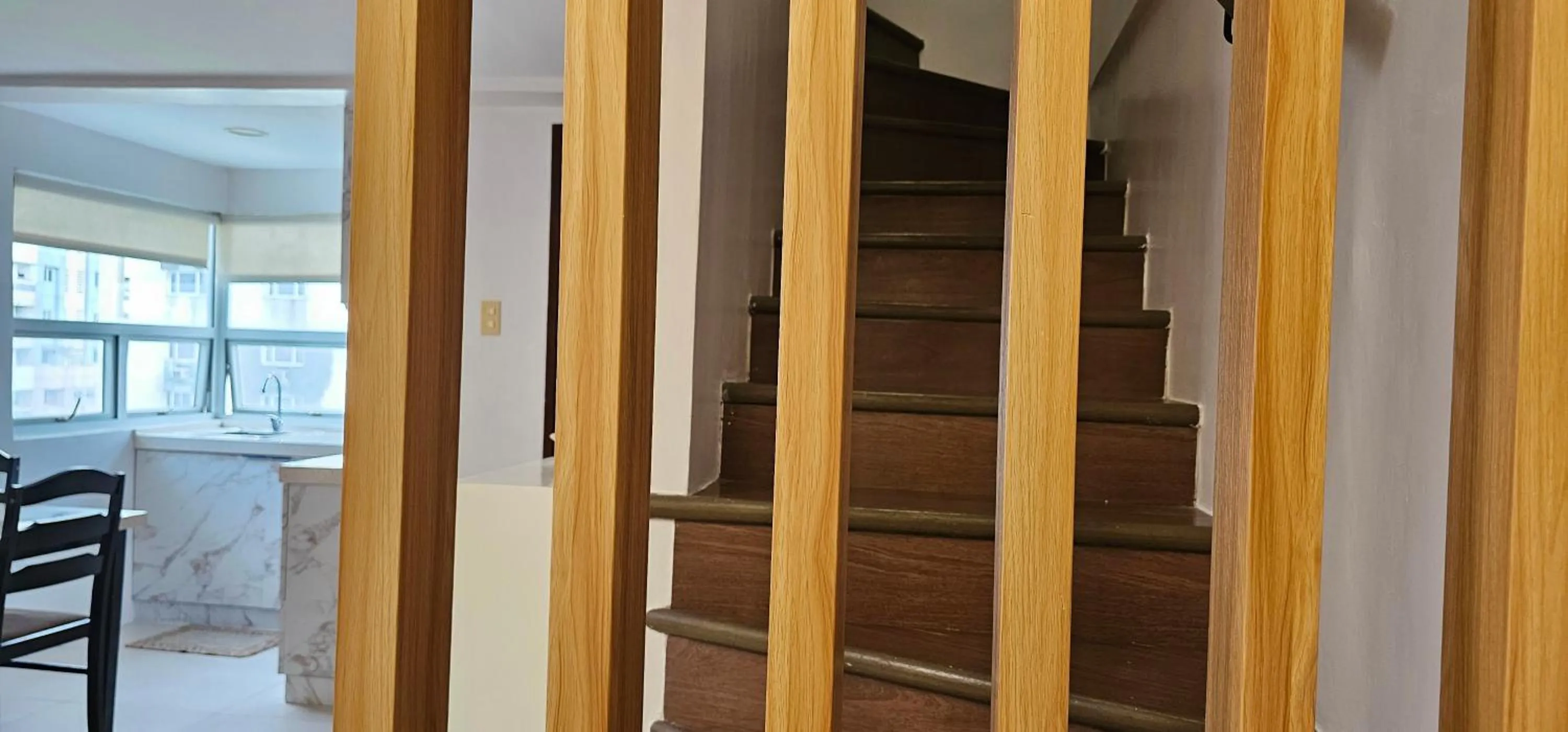 Living room in Gilmore Tower Suites By SMS Hospitality