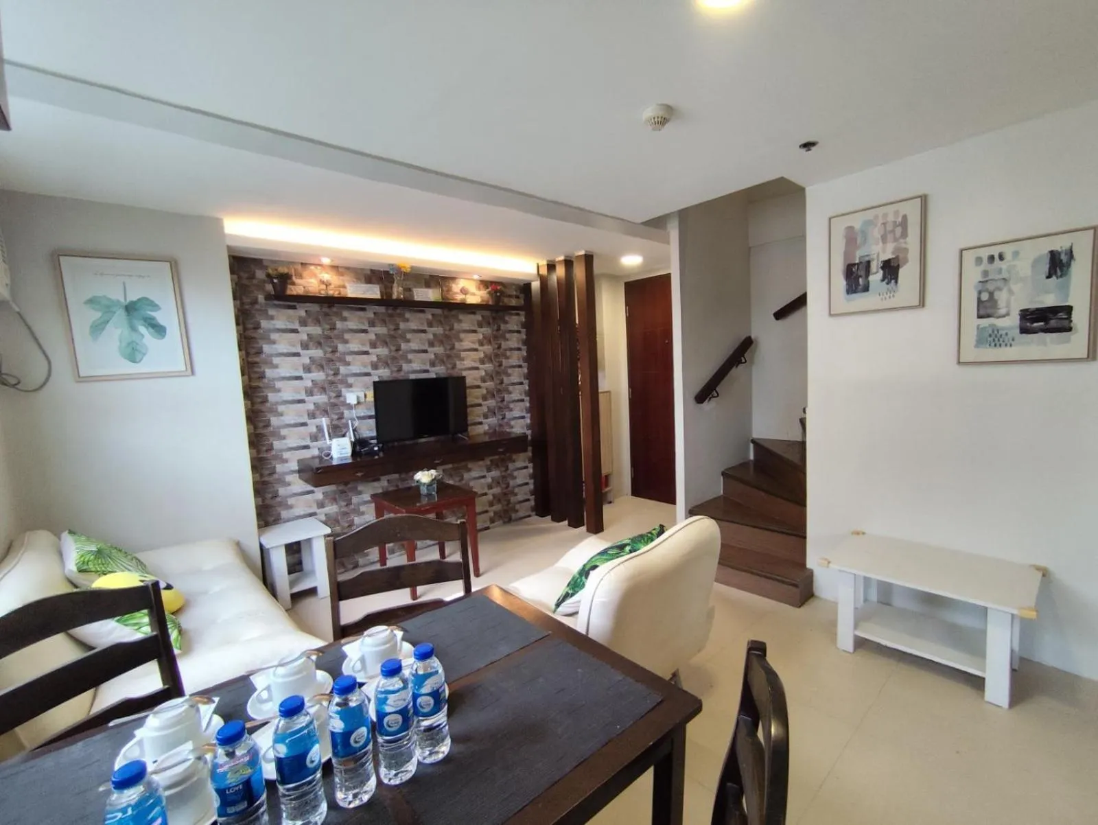 Dining area in Gilmore Tower Suites By SMS Hospitality