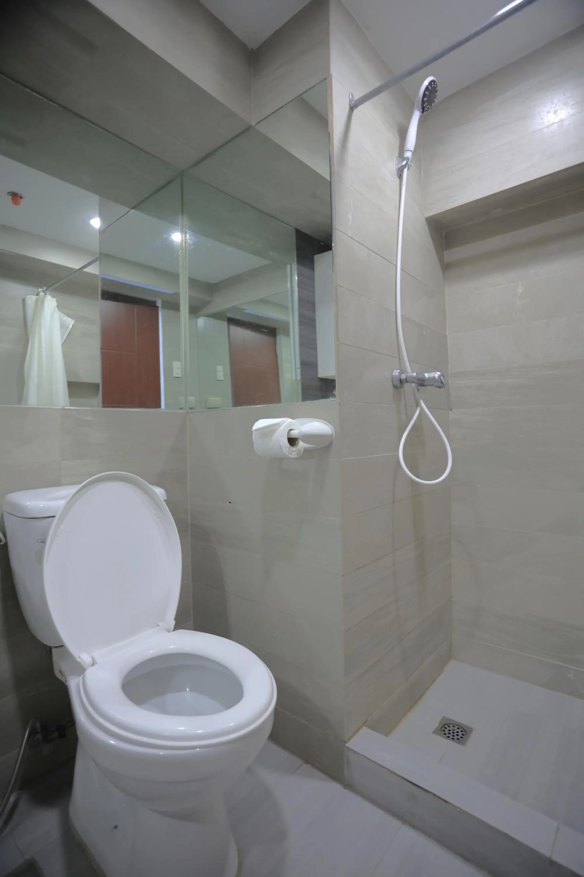 Shower in Gilmore Tower Suites By SMS Hospitality