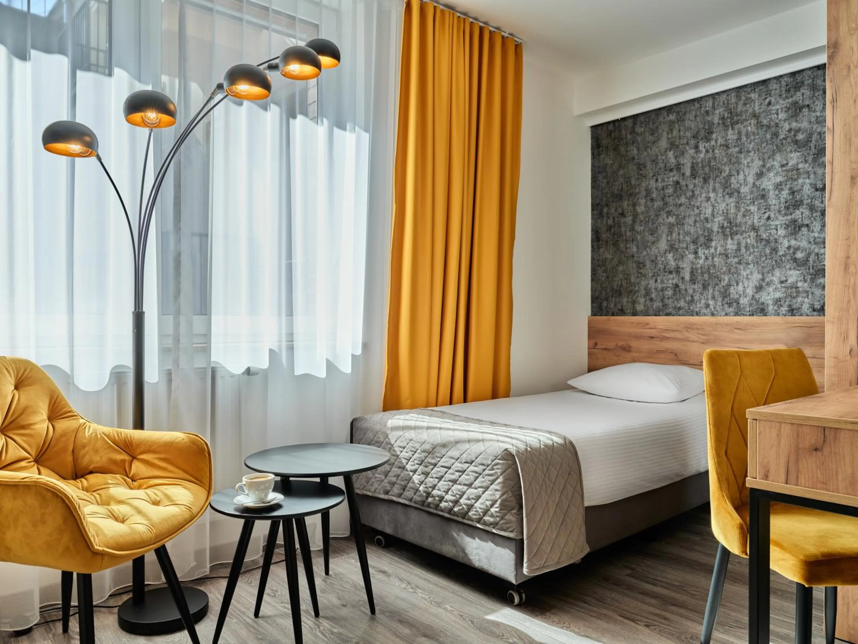 Bed in 1891 Garni Hotel