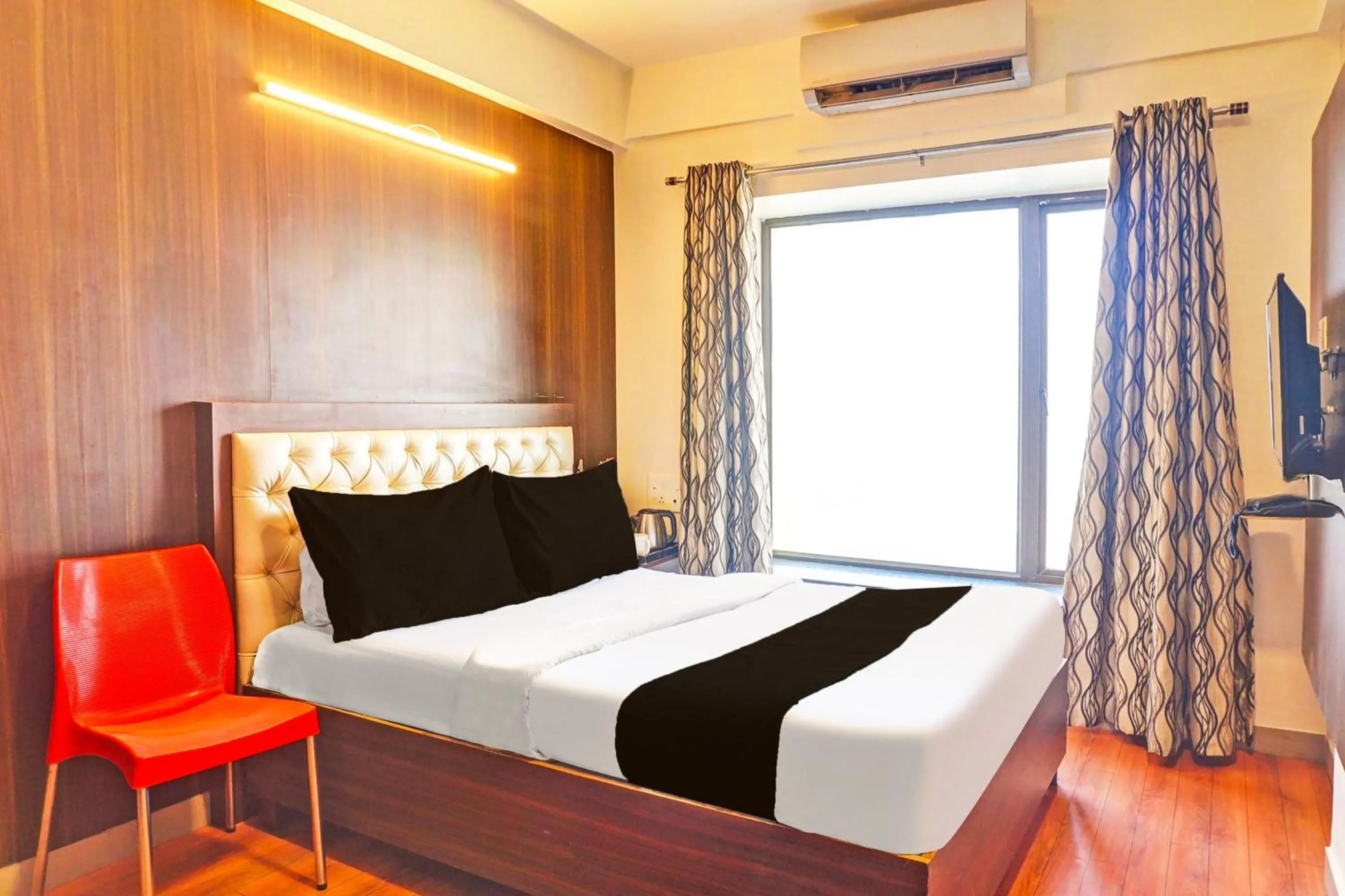 Bedroom in Hotel O Pearl Inn