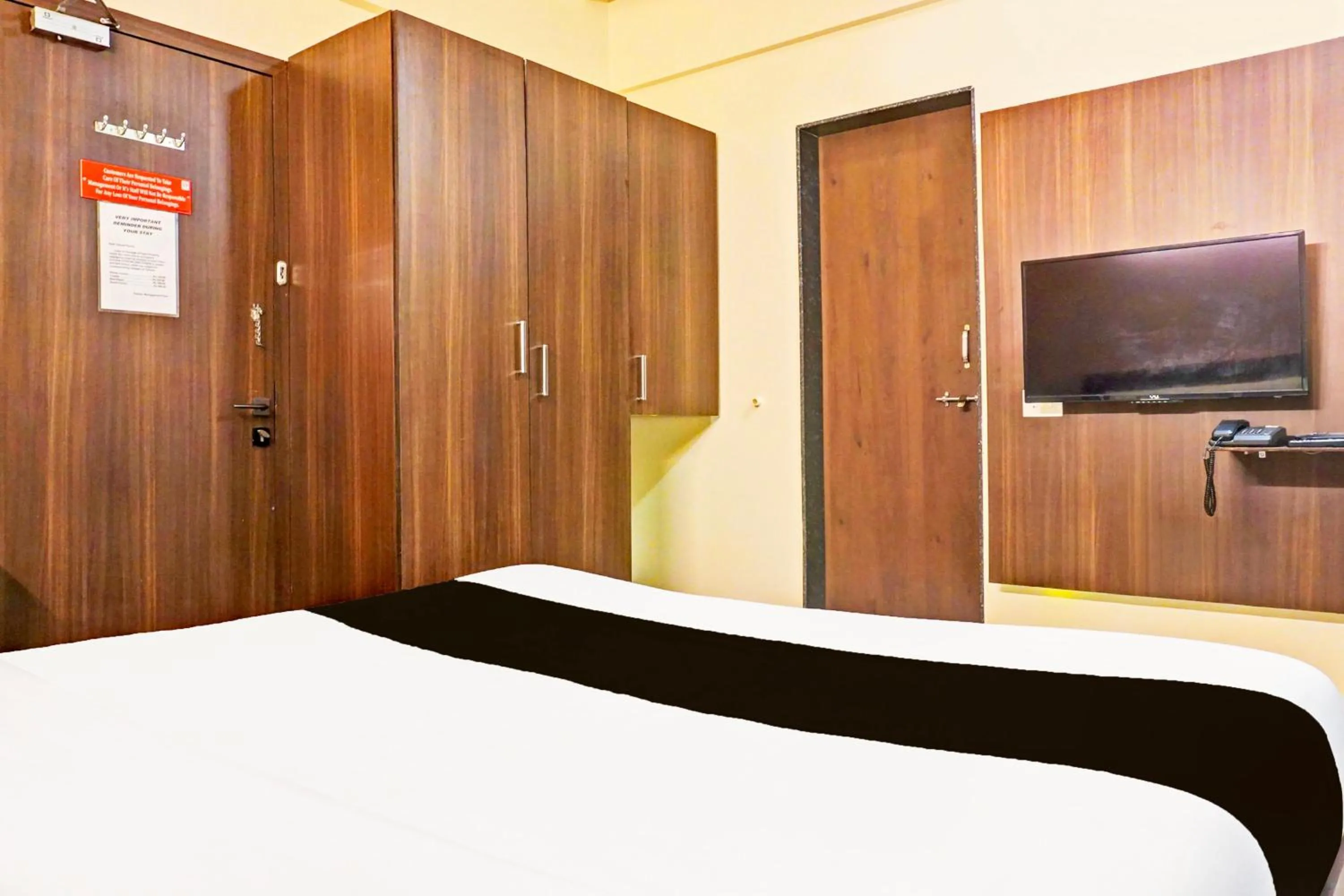 Bedroom in Hotel O Pearl Inn