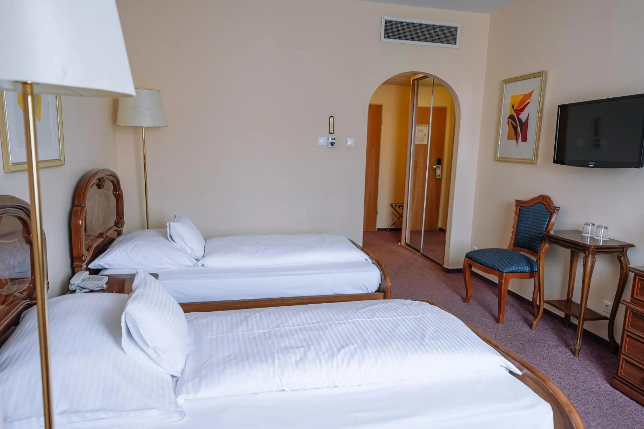 Bed in Pannonia Hotel