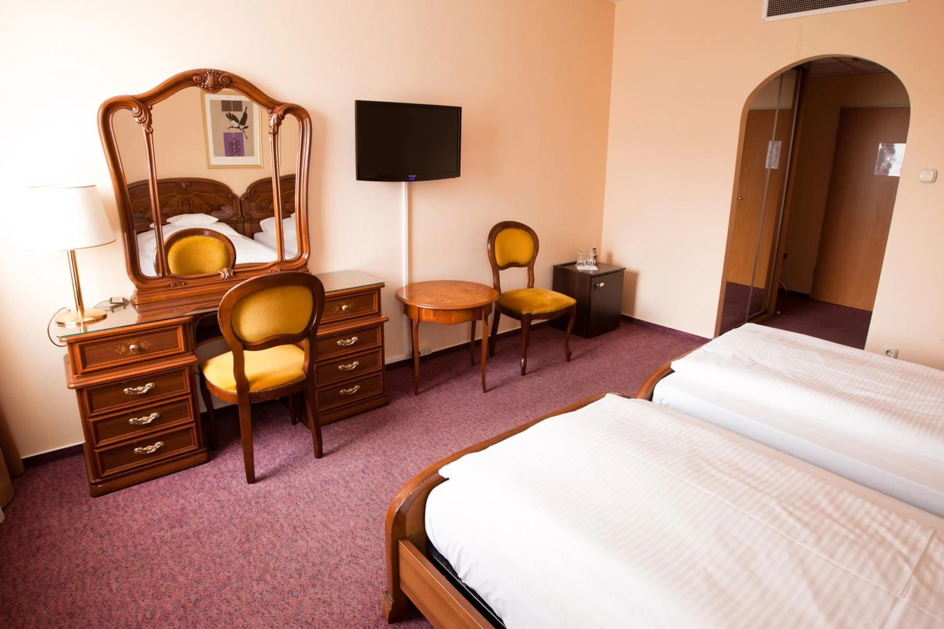 Bed in Pannonia Hotel