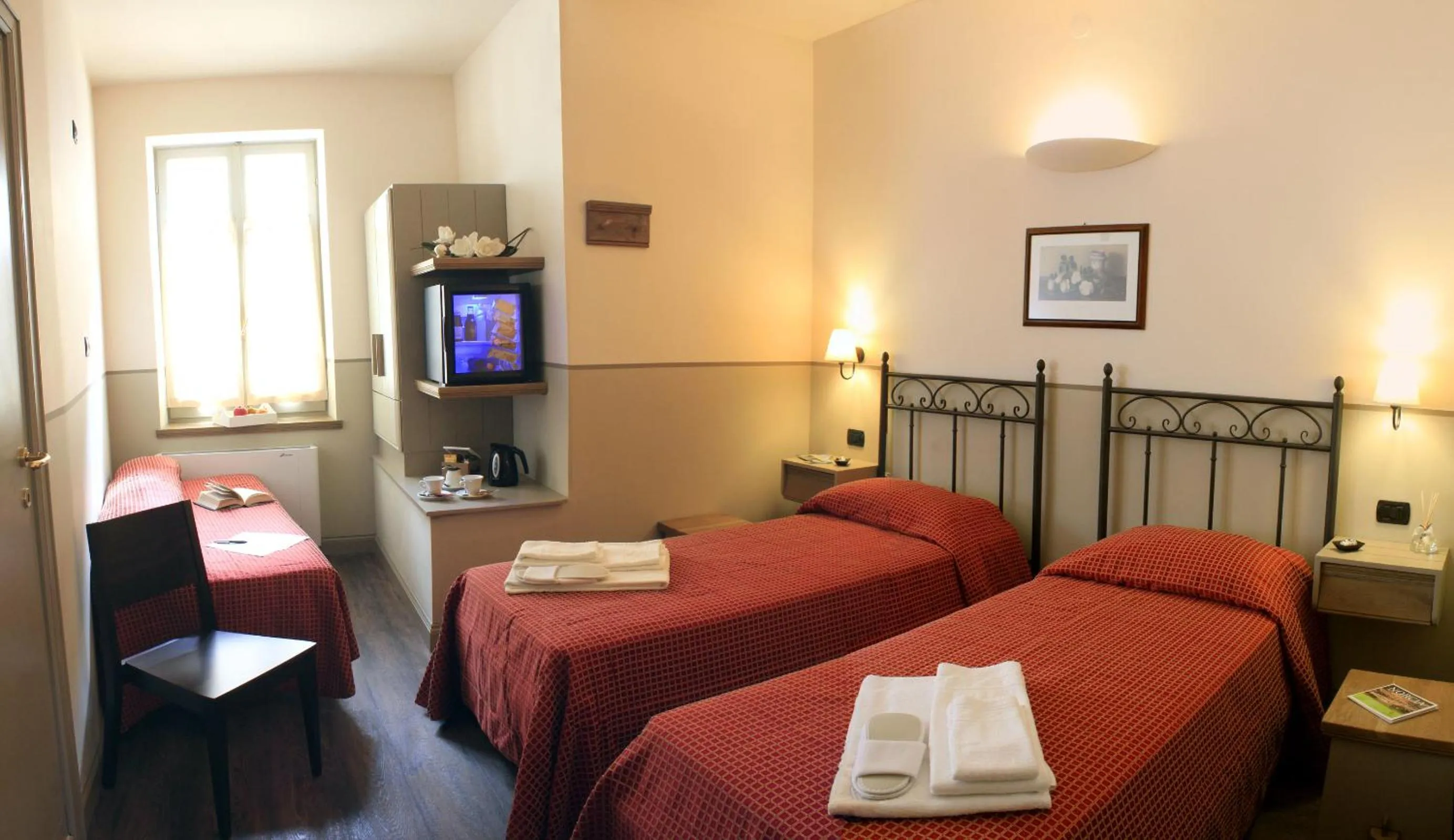 Bed in Albergo Benito