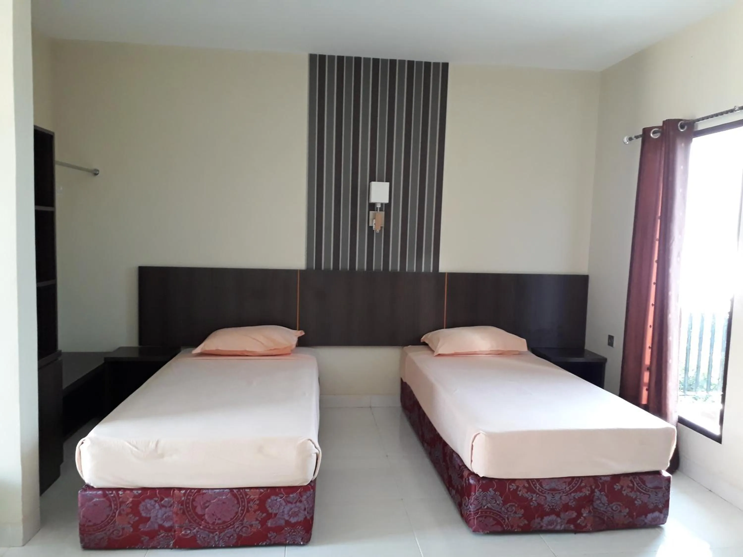 Bed in Bukit Kenari Hotel & Restaurant