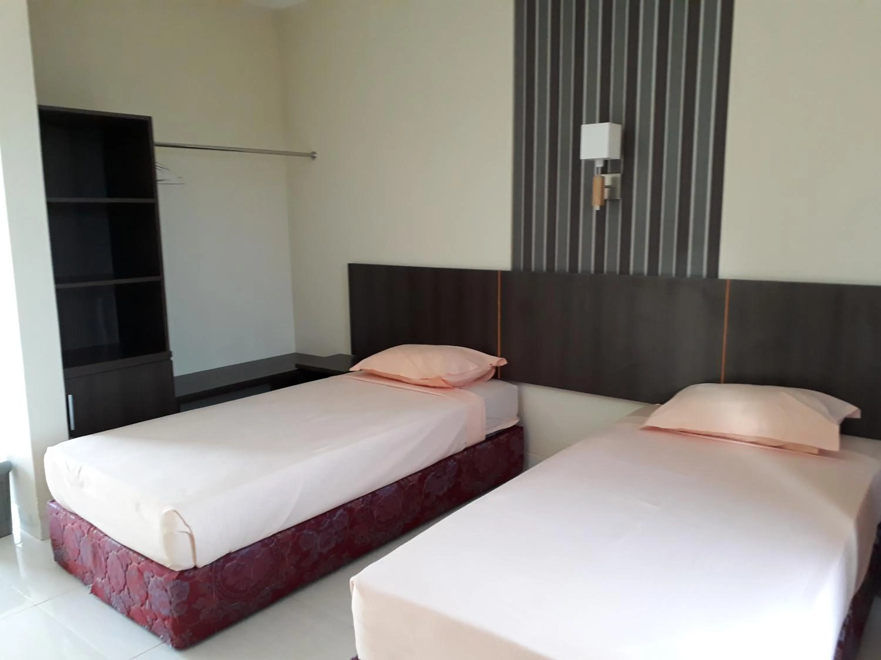 Bed in Bukit Kenari Hotel & Restaurant