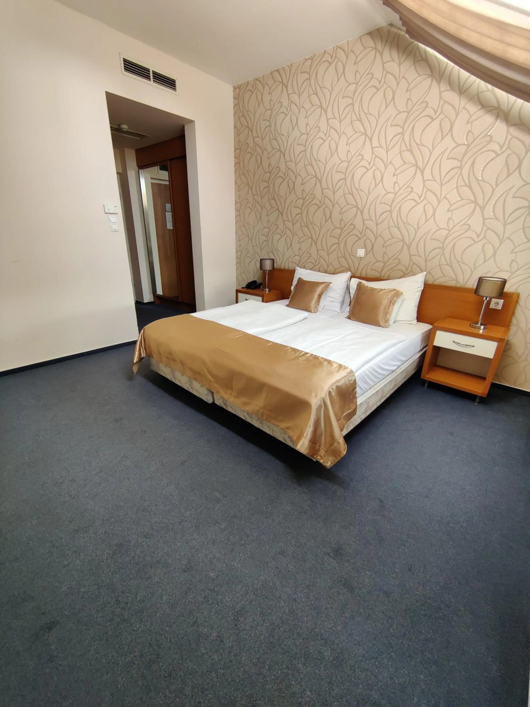 Bed in Boutique Hotel Sopianae