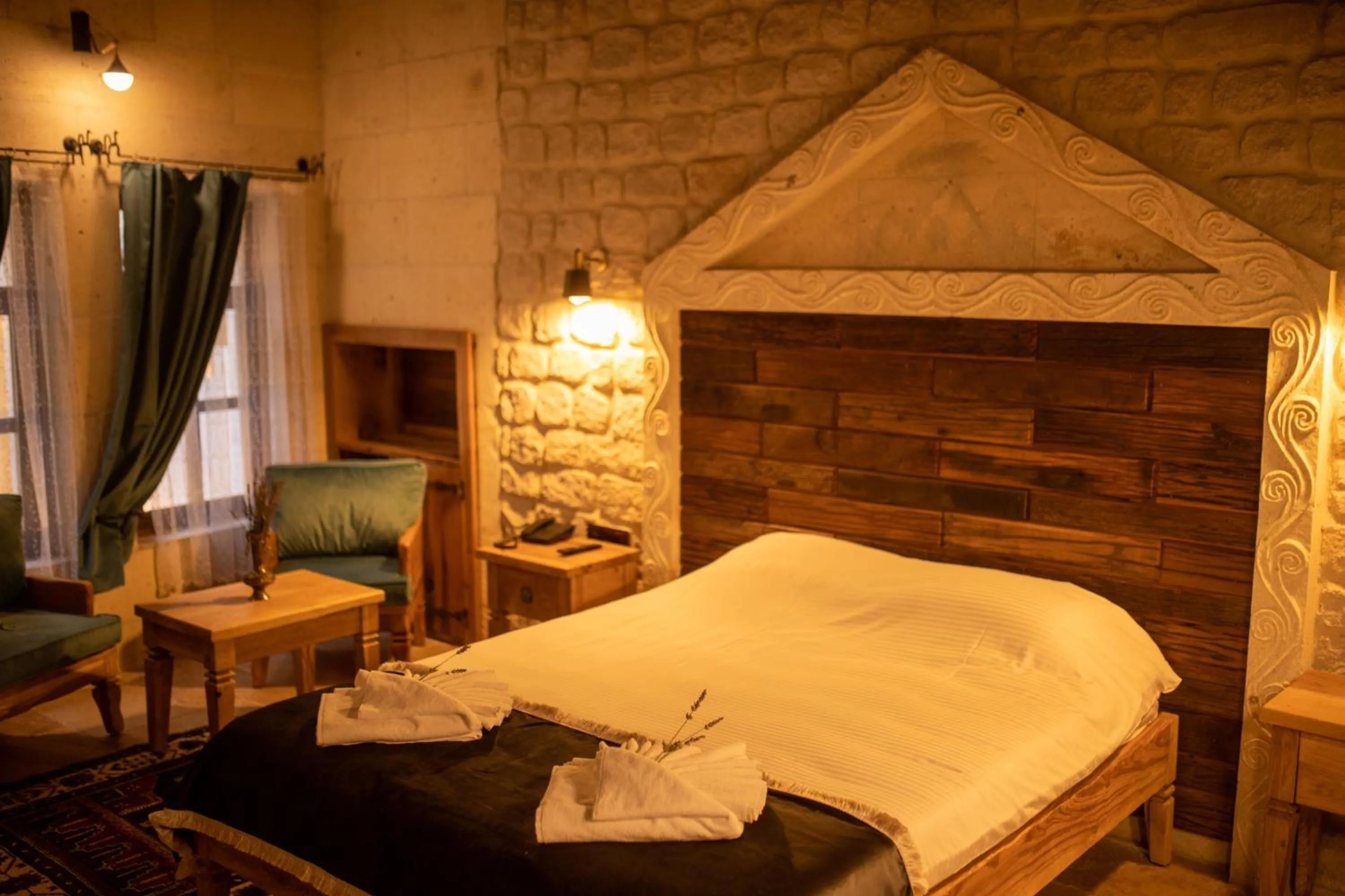 Bed in Pome Granate Cave Hotel