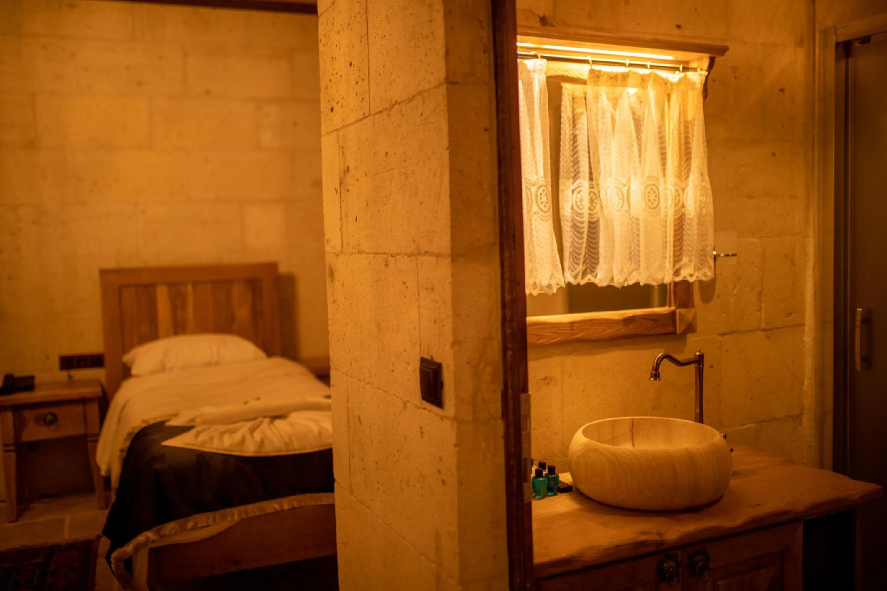 Bed in Pome Granate Cave Hotel