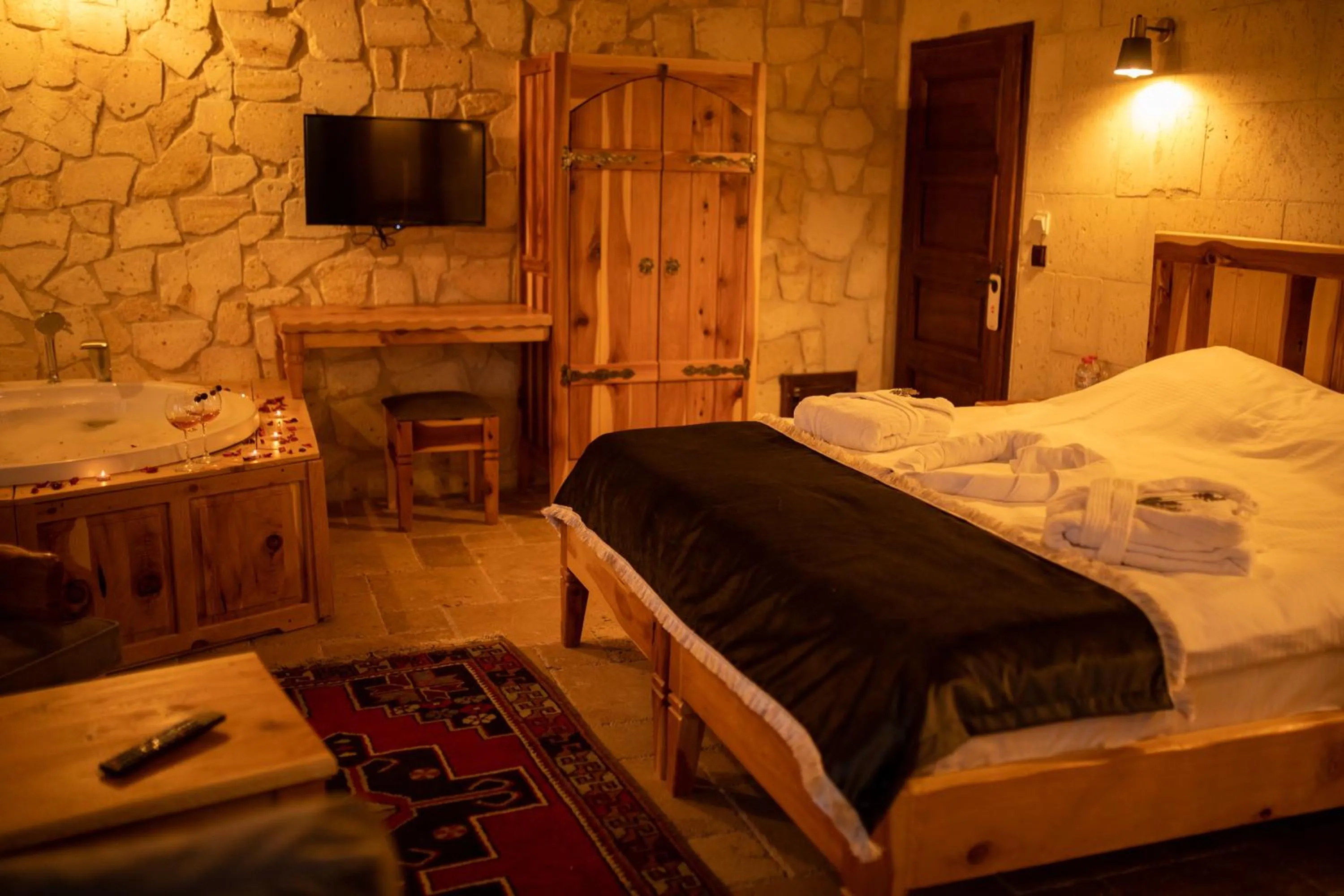 Bed in Pome Granate Cave Hotel
