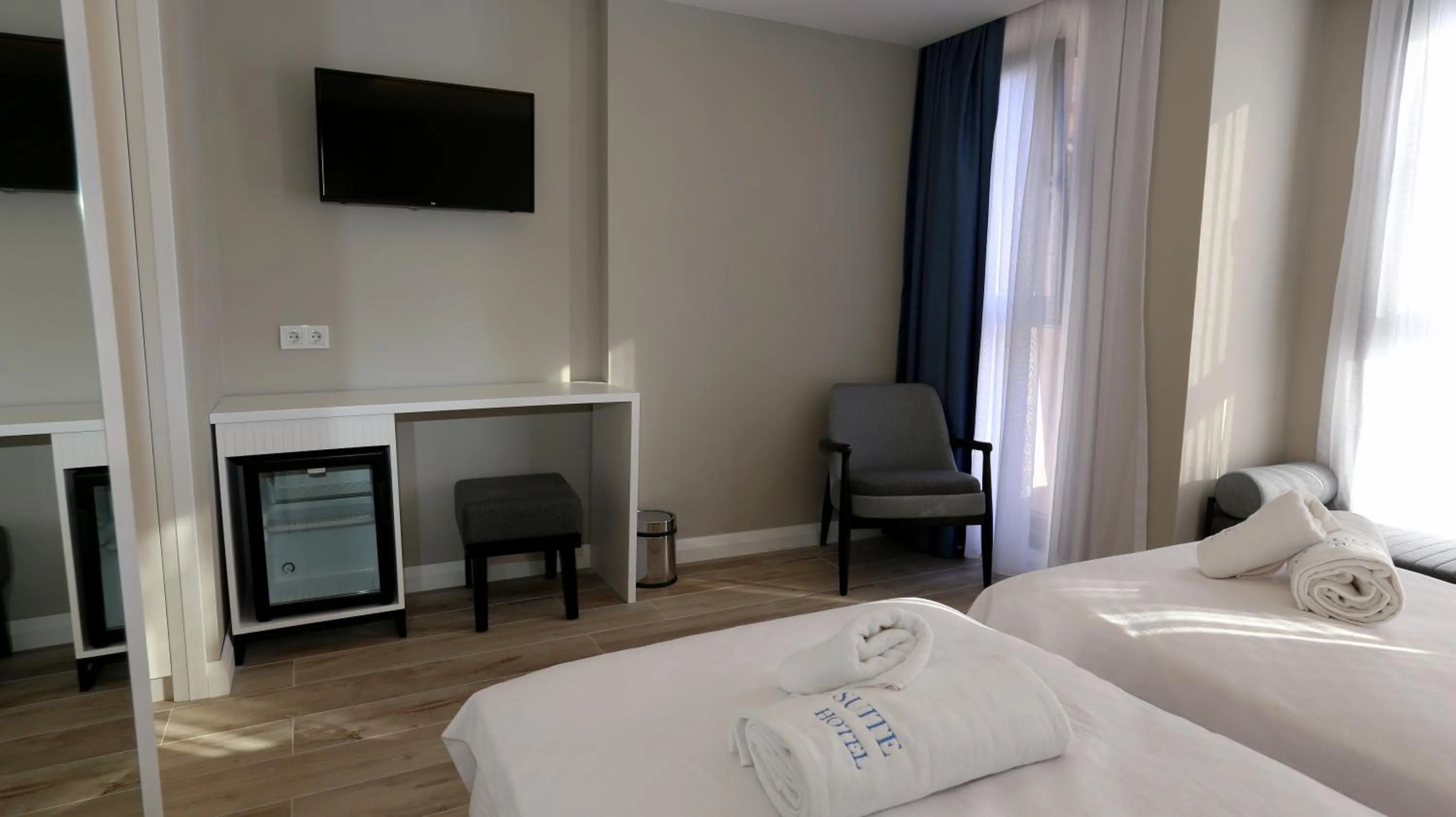 Bed in Sel Suite Hotel