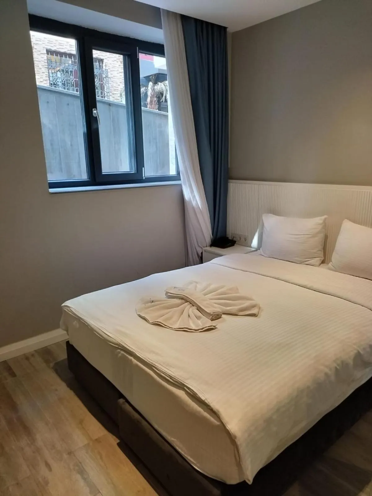 Bed in Sel Suite Hotel