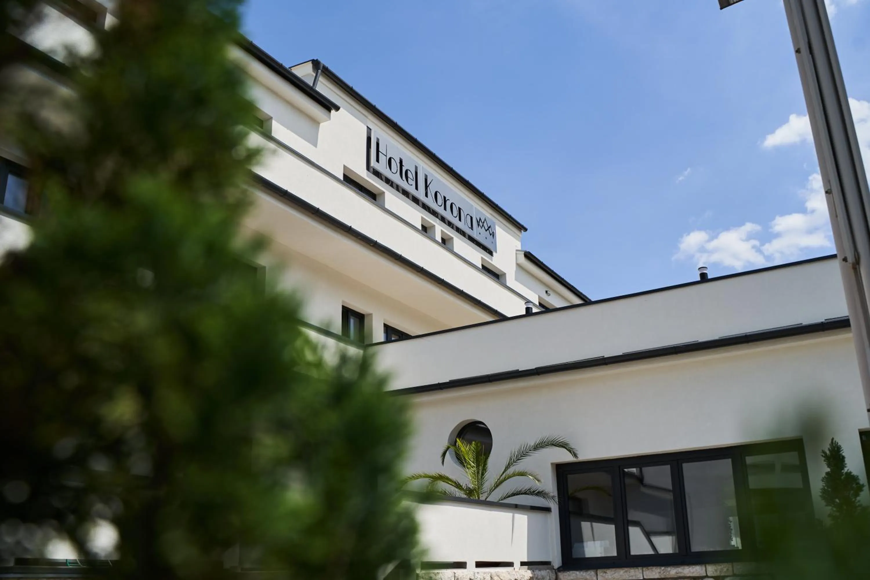 Property logo or sign in Hotel Korona